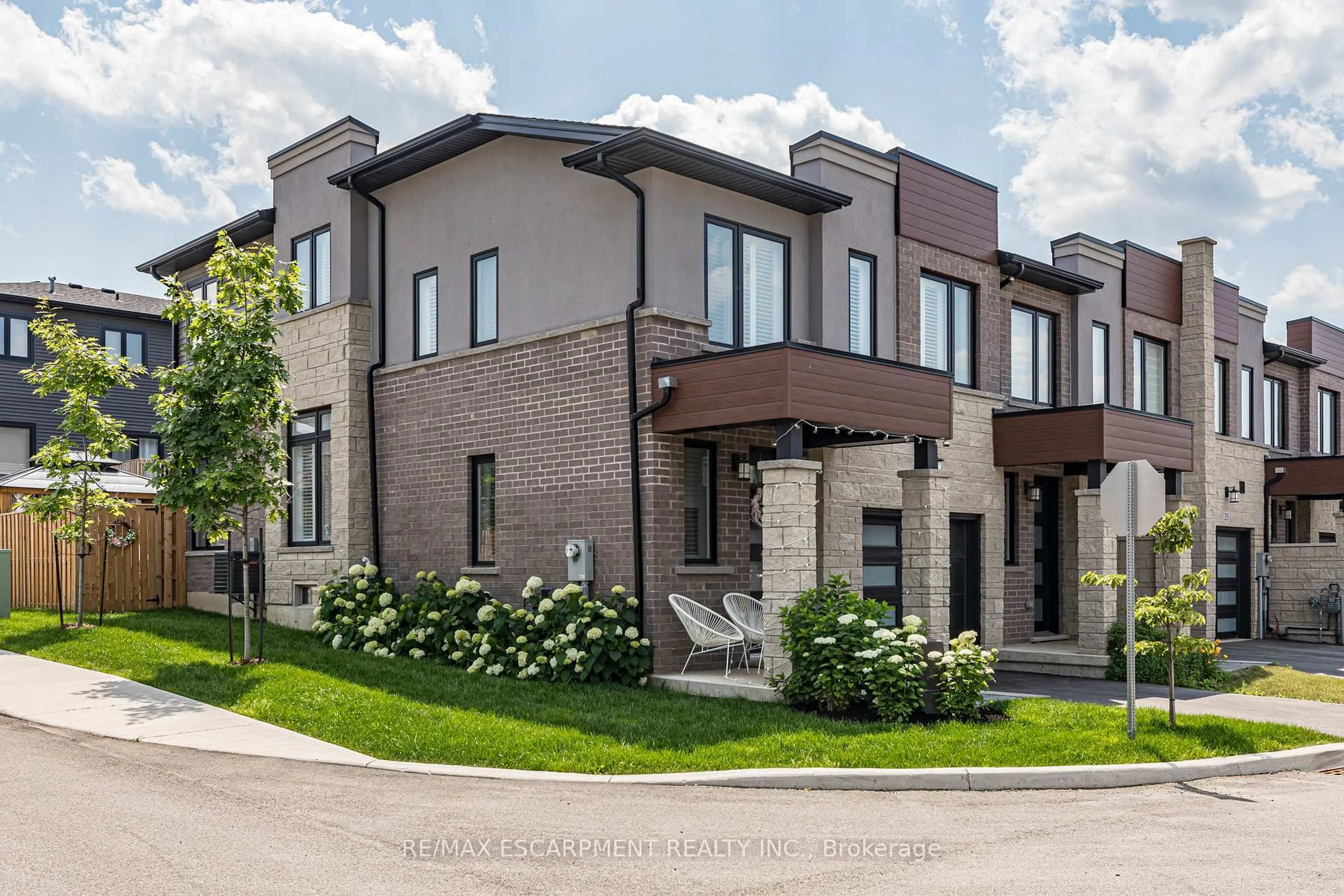 Home with brick exterior material, street for 31 Southam Lane, Hamilton Ontario L9C 0E9