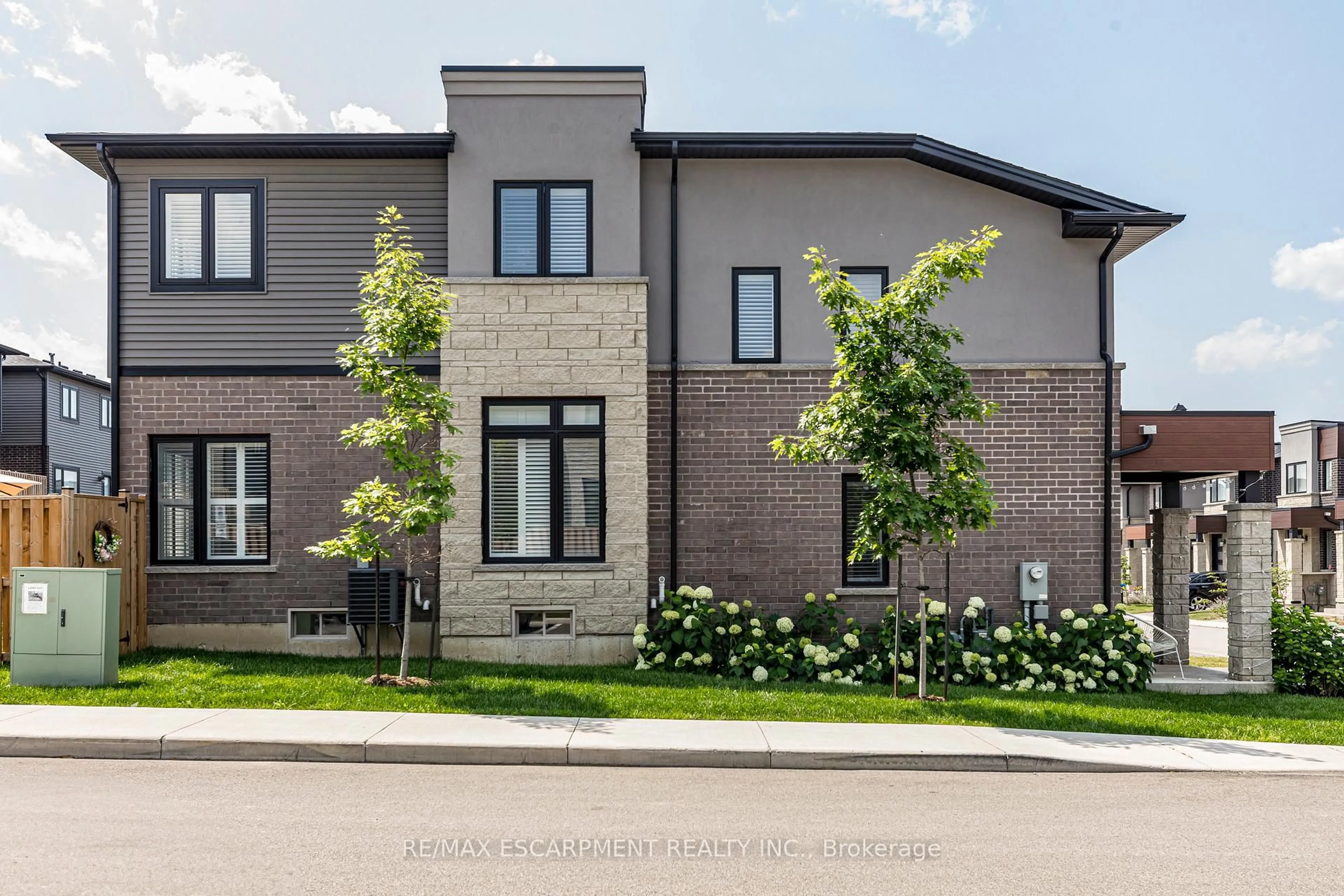 Home with brick exterior material, street for 31 Southam Lane, Hamilton Ontario L9C 0E9