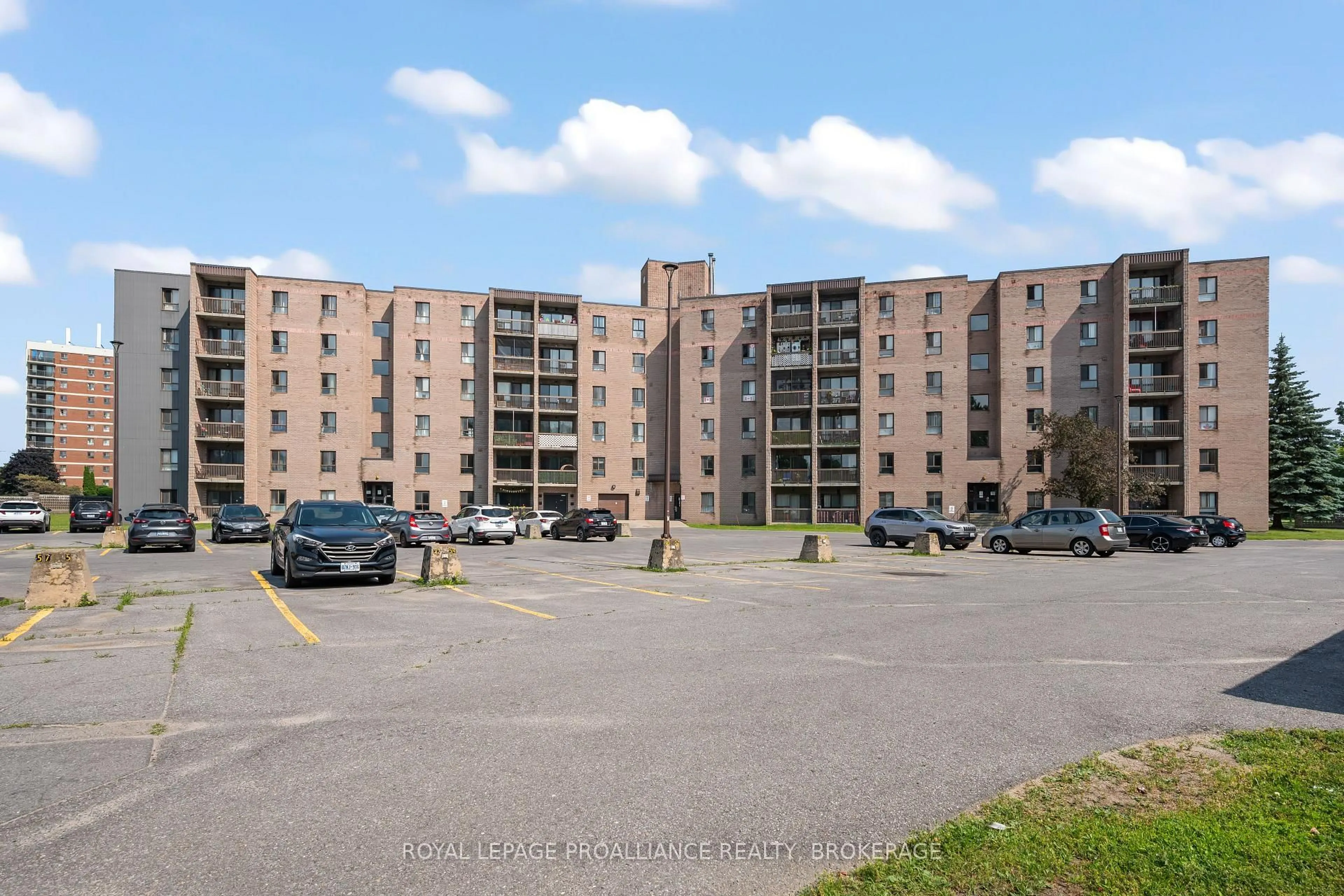 A pic from outside/outdoor area/front of a property/back of a property/a pic from drone, building for 17 Eldon Hall Pl #203, Kingston Ontario K7M 7H5