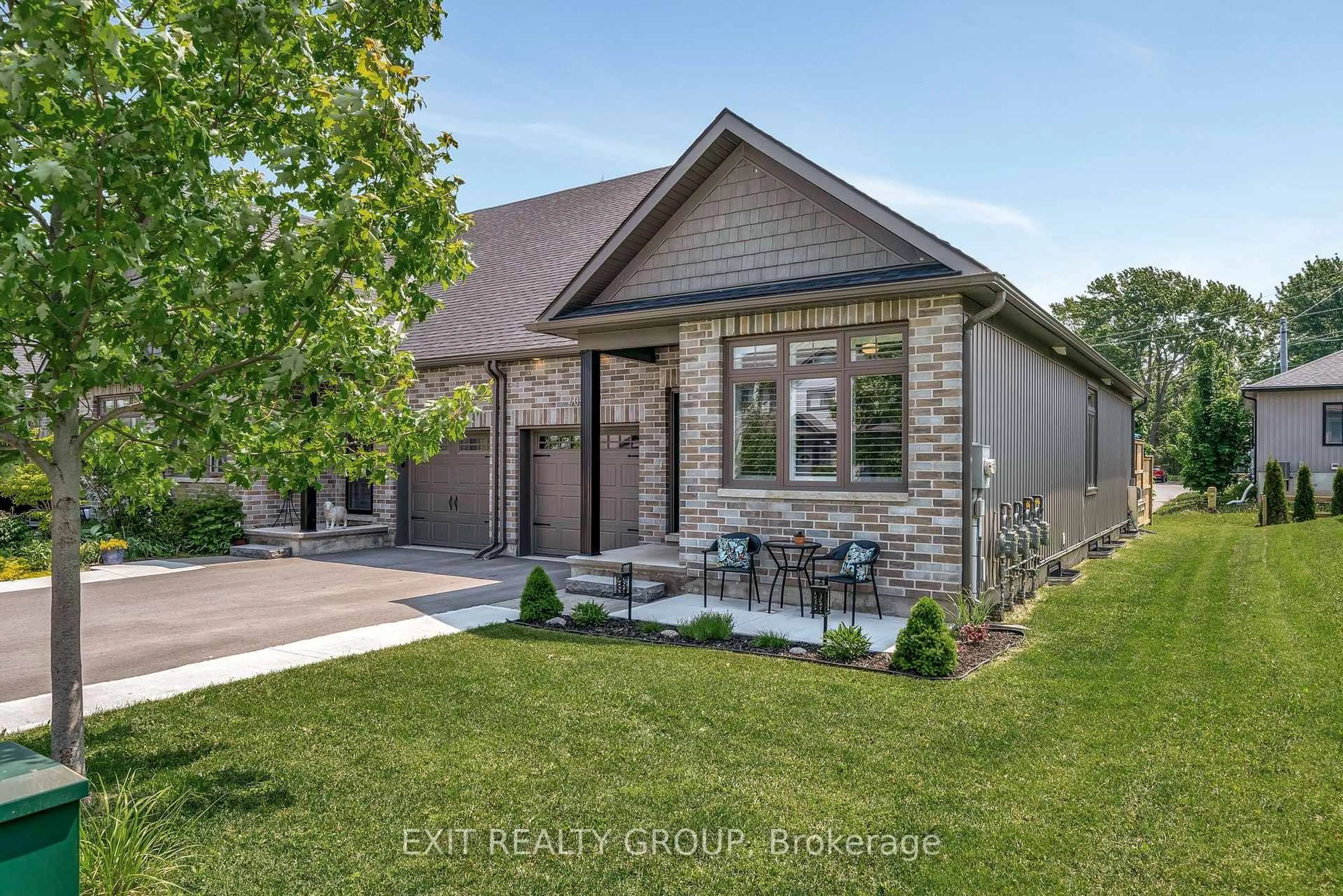 Home with brick exterior material, street for 40 Curtis St, Prince Edward County Ontario K0K 2T0