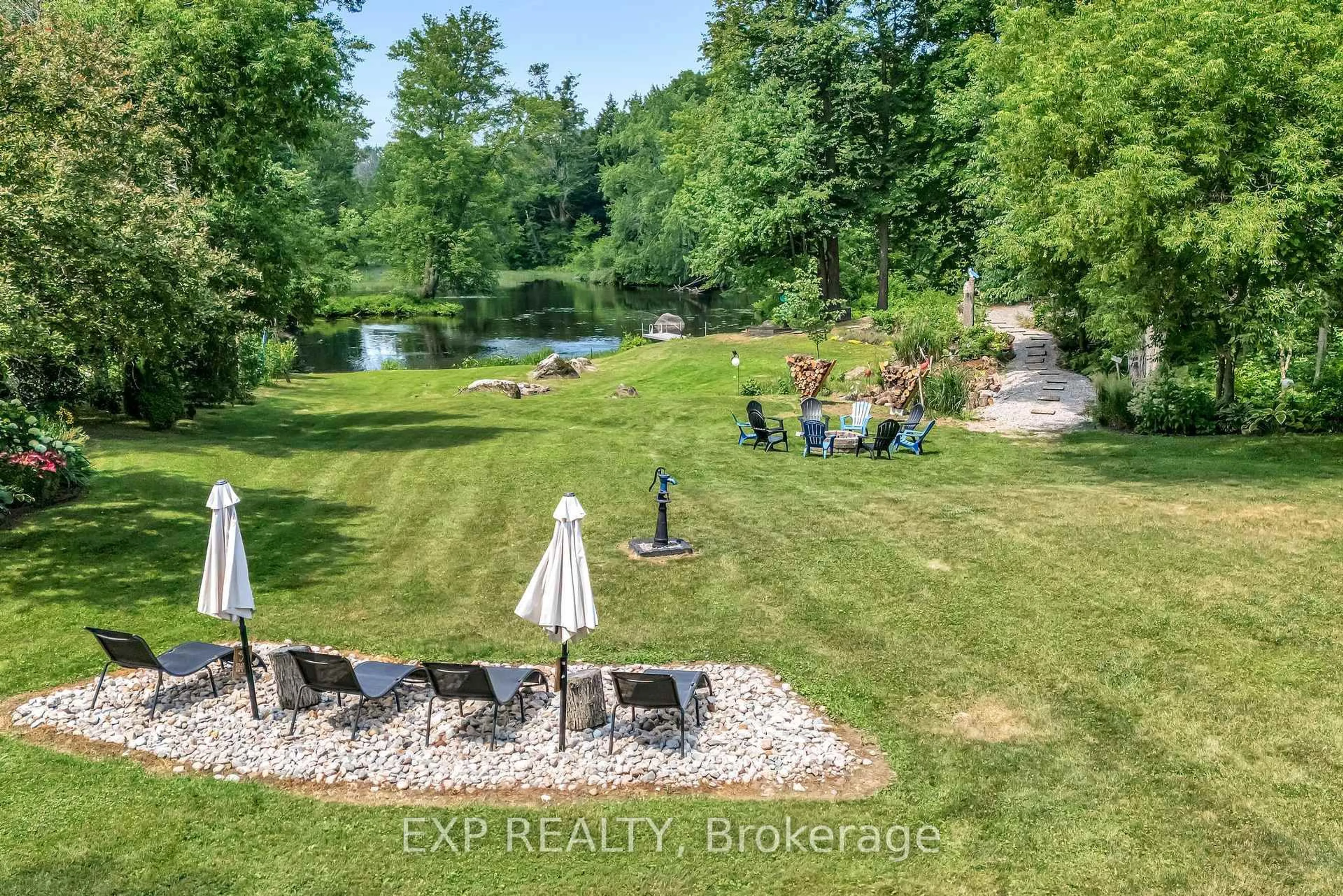 A pic from outside/outdoor area/front of a property/back of a property/a pic from drone, water/lake/river/ocean view for 27 Lost Channel Crt, Thomasburg Ontario K0K 3H0