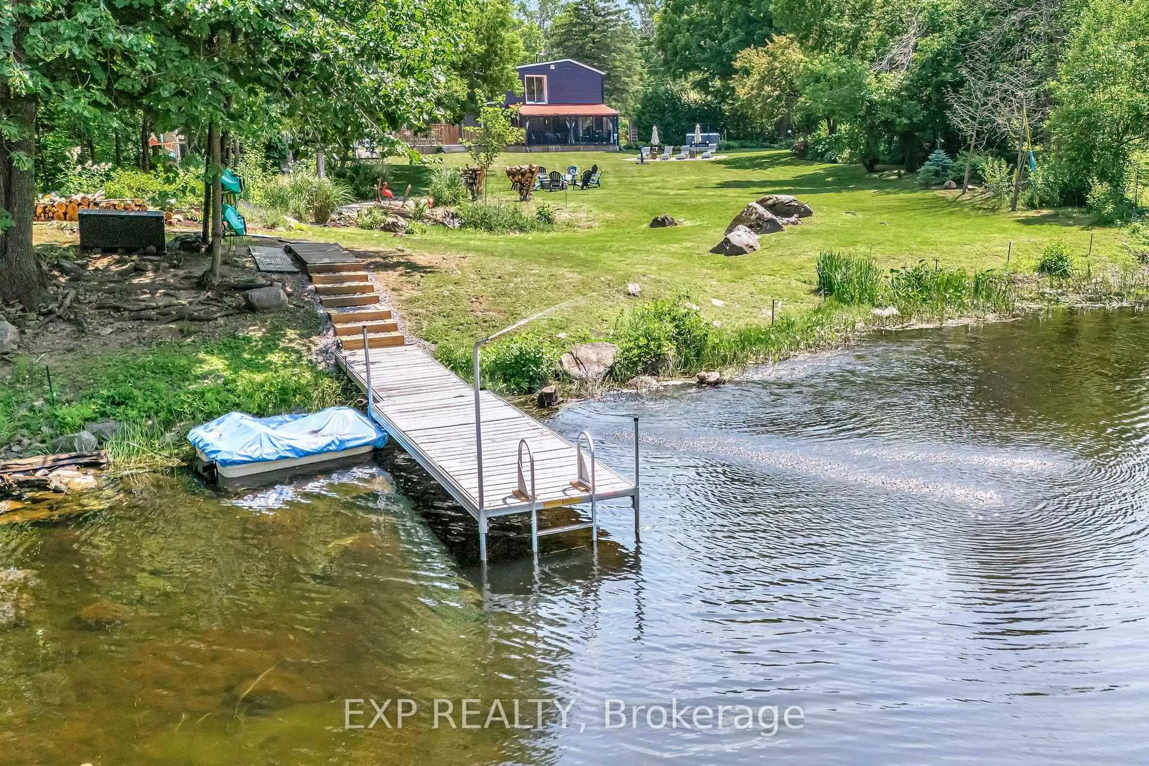 A pic from outside/outdoor area/front of a property/back of a property/a pic from drone, water/lake/river/ocean view for 27 Lost Channel Crt, Thomasburg Ontario K0K 3H0