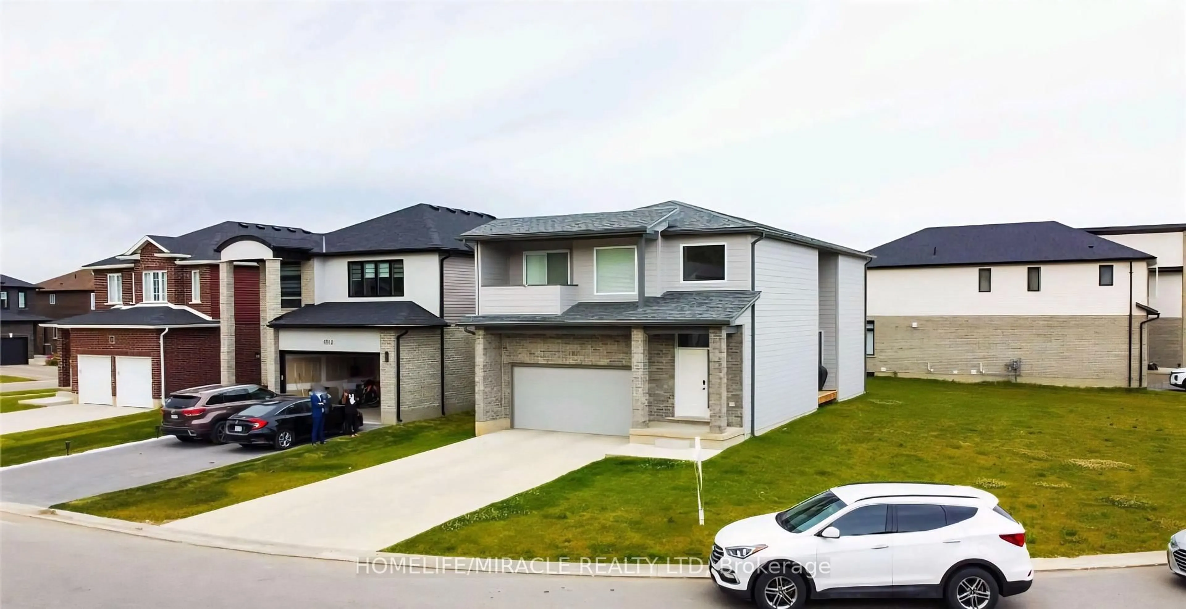 A pic from outside/outdoor area/front of a property/back of a property/a pic from drone, street for 1301 Sandbar St, London North Ontario N6G 0Y3