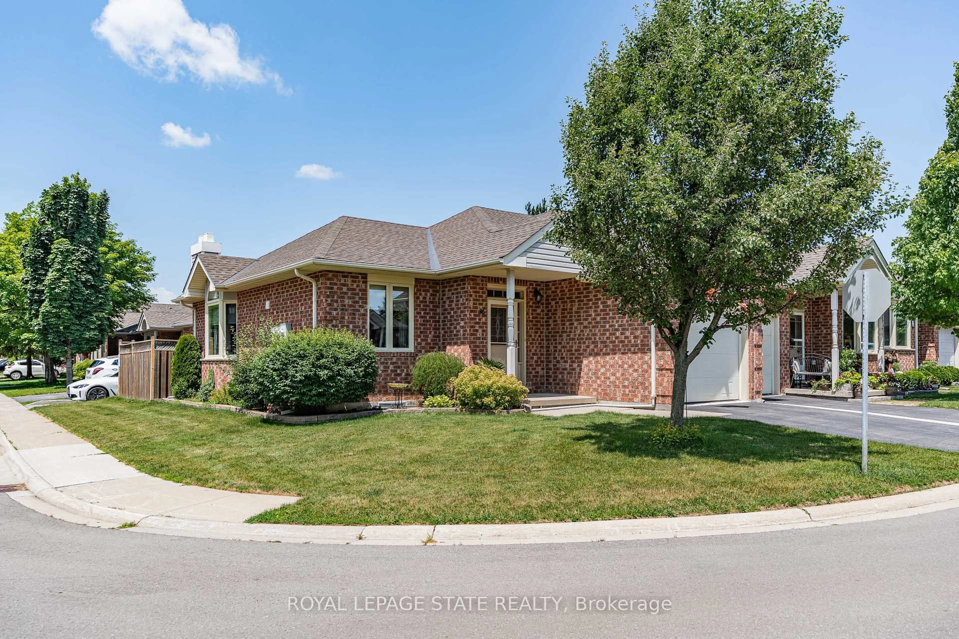 Home with brick exterior material, street for 36 Twentyplace Blvd, Hamilton Ontario L0R 1W0