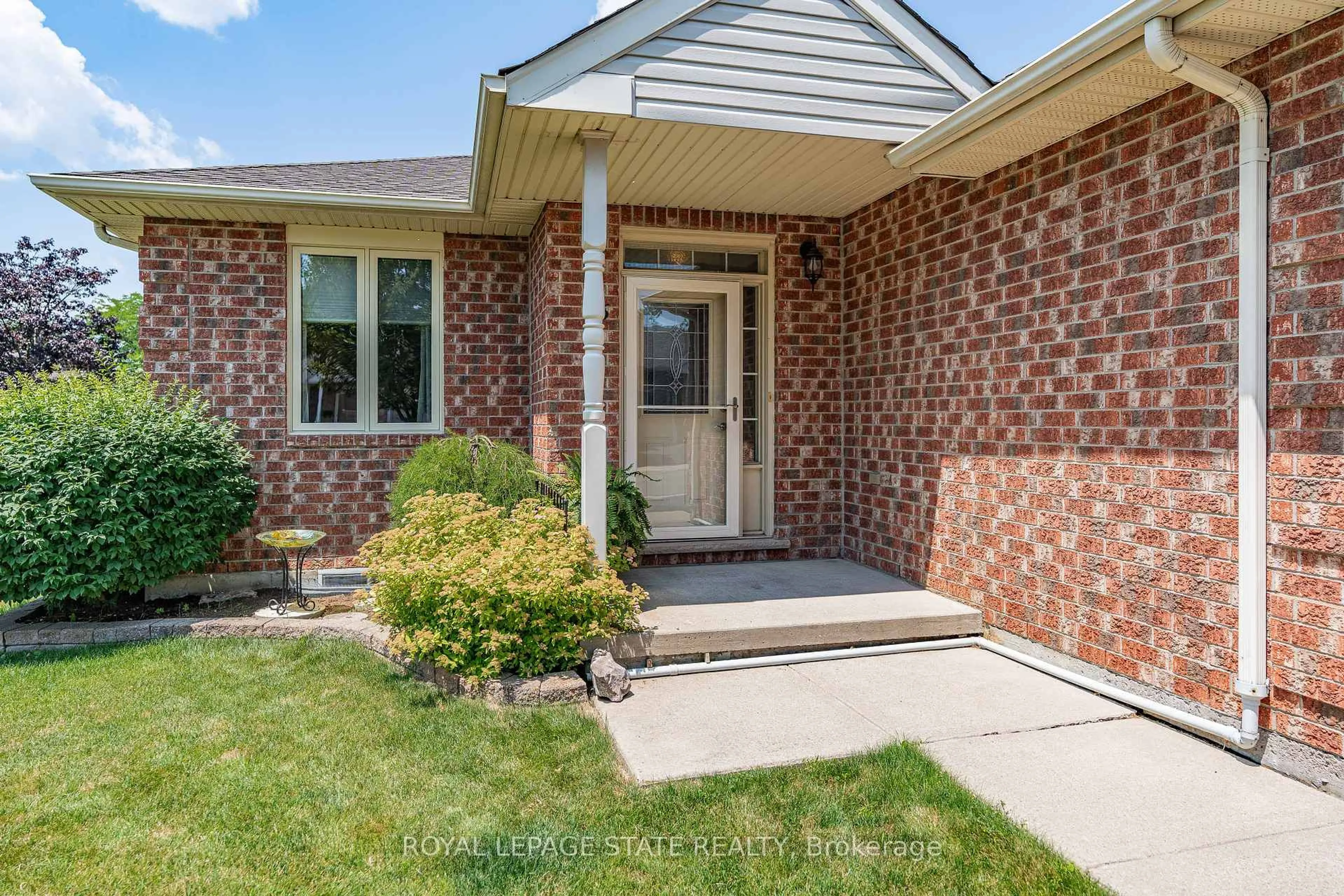 Home with brick exterior material, street for 36 Twentyplace Blvd, Hamilton Ontario L0R 1W0