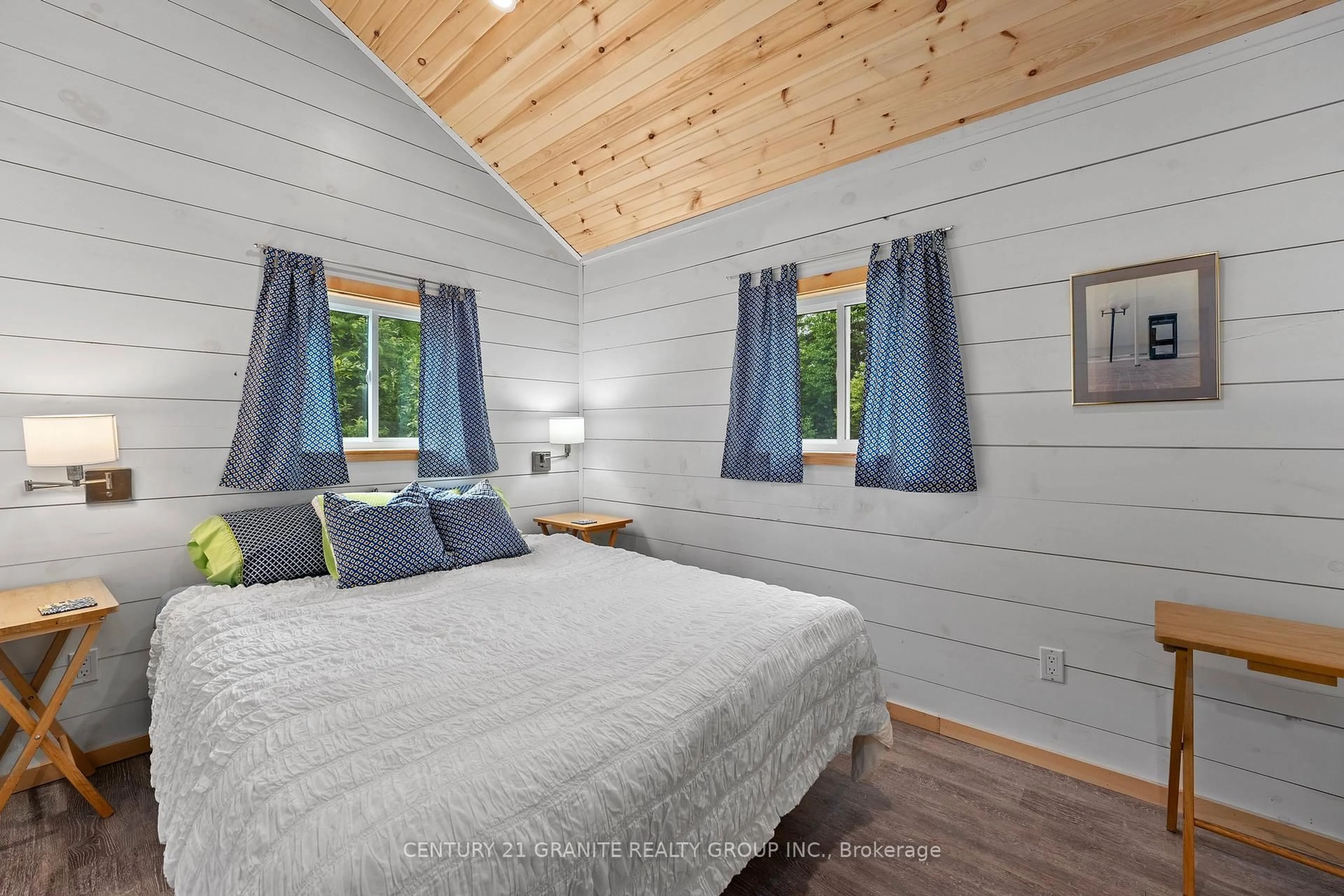 Bedroom with bed, wood/laminate floor for 1224 Hagen Rd, Highlands East Ontario K0L 2A0