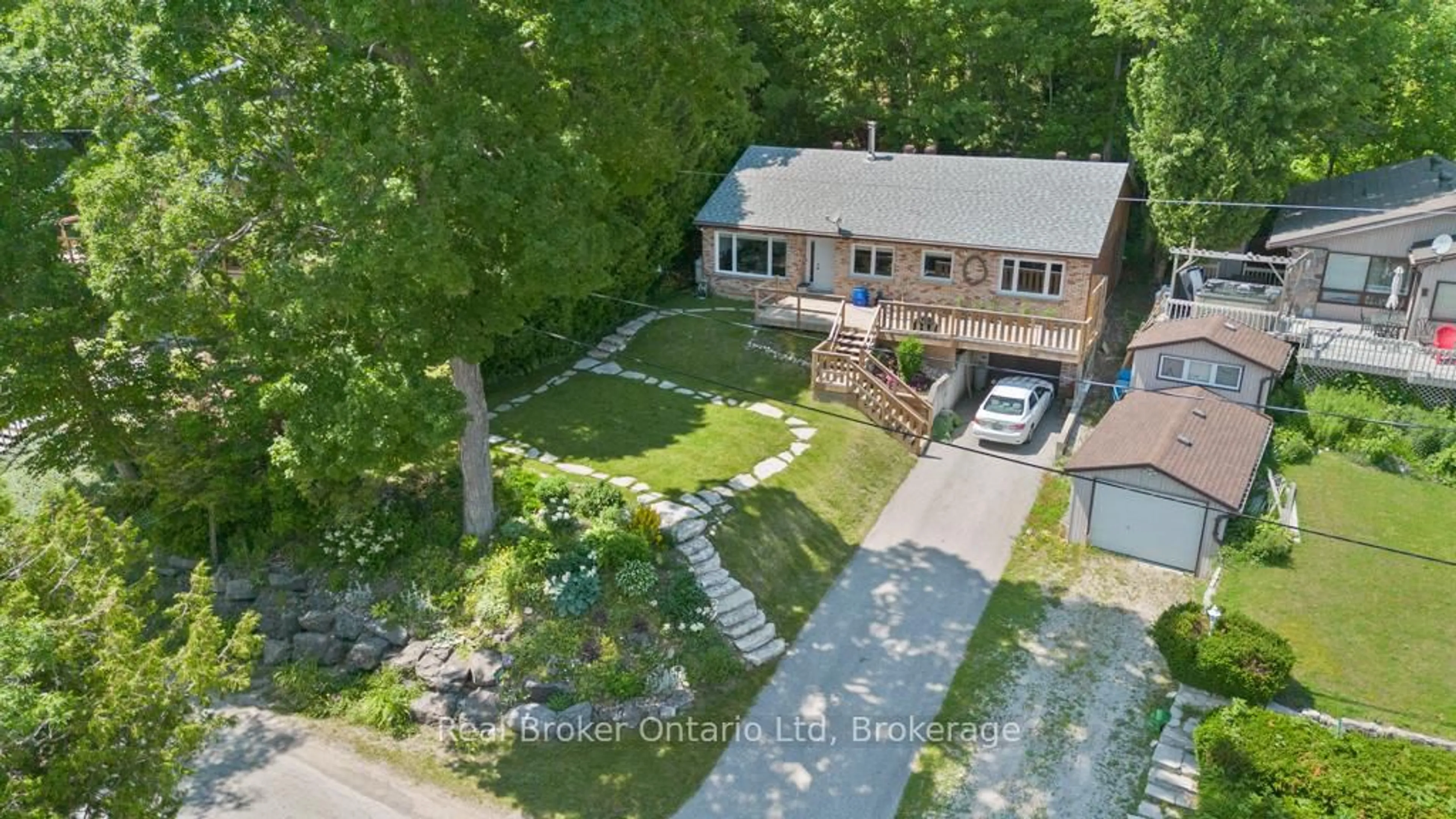A pic from outside/outdoor area/front of a property/back of a property/a pic from drone, street for 121 Mallory Beach Rd, South Bruce Peninsula Ontario N0H 2T0