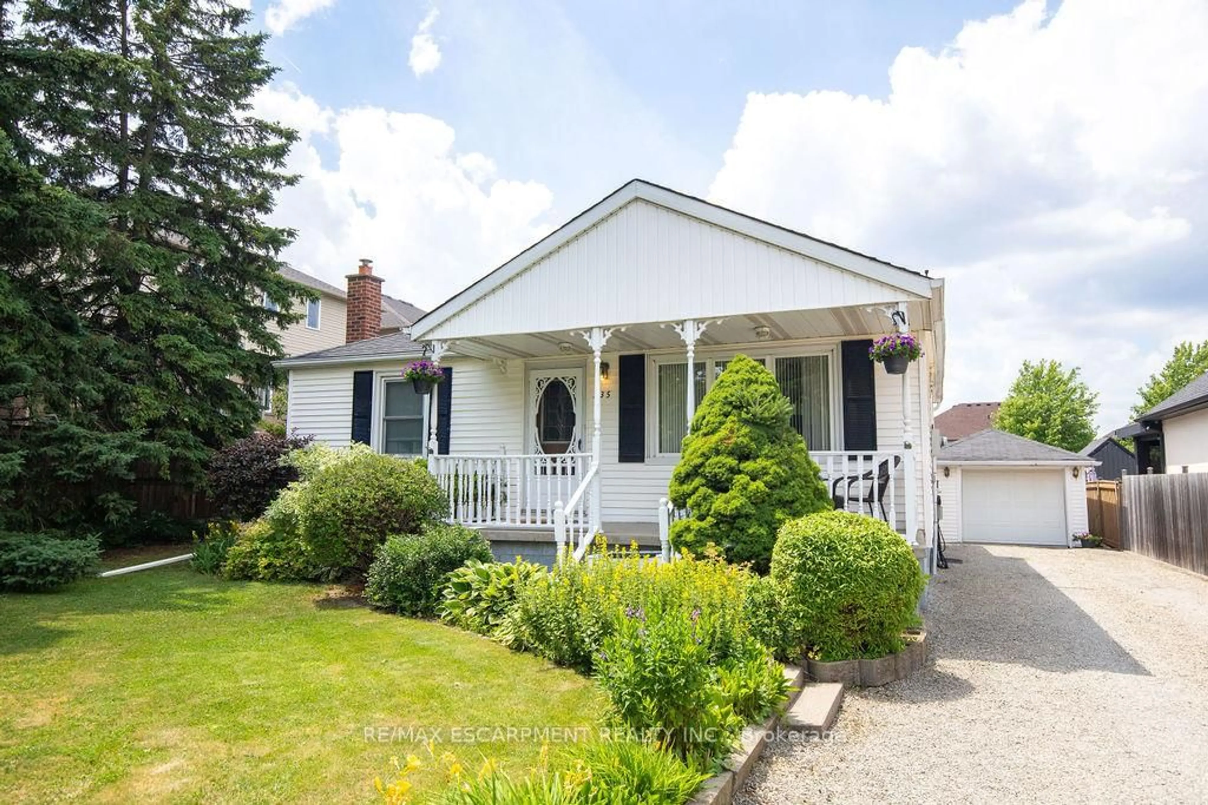 Home with vinyl exterior material, street for 235 Upper Mount Albion Rd, Hamilton Ontario L8J 1V1