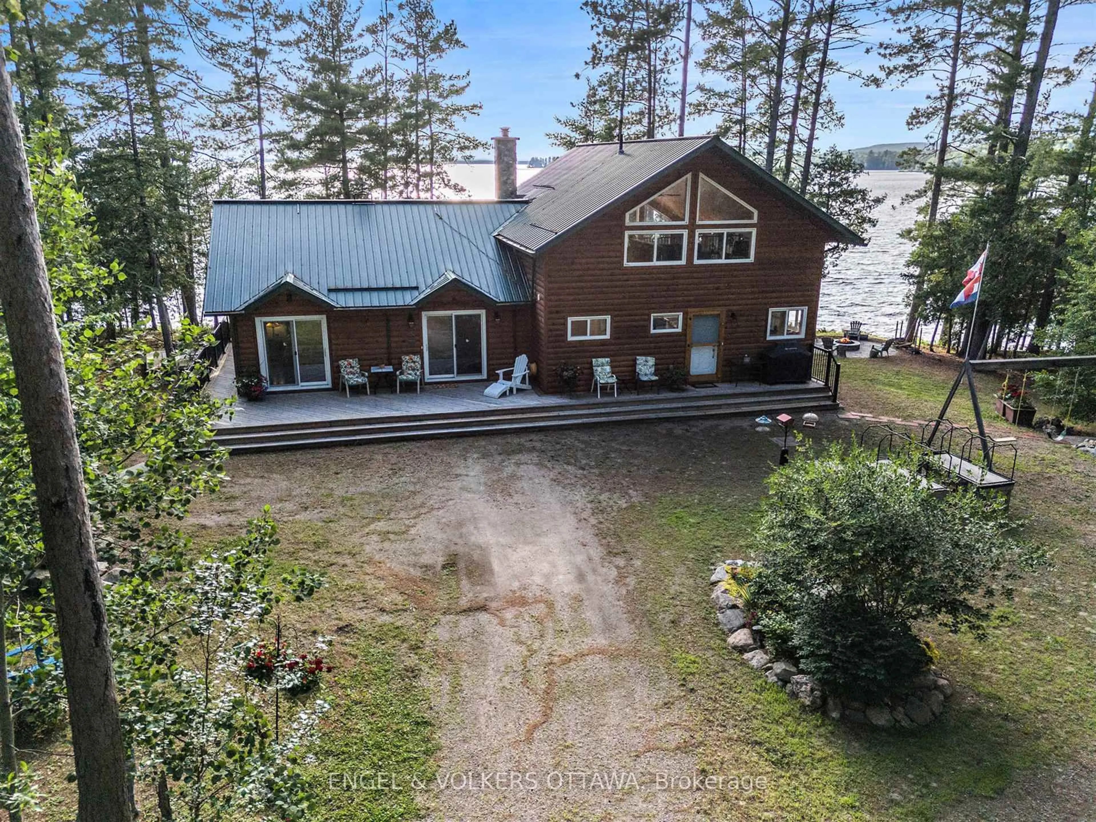 A pic from outside/outdoor area/front of a property/back of a property/a pic from drone, water/lake/river/ocean view for 631 Golden Lyn Way, Golden Lake Ontario K0J 1X0