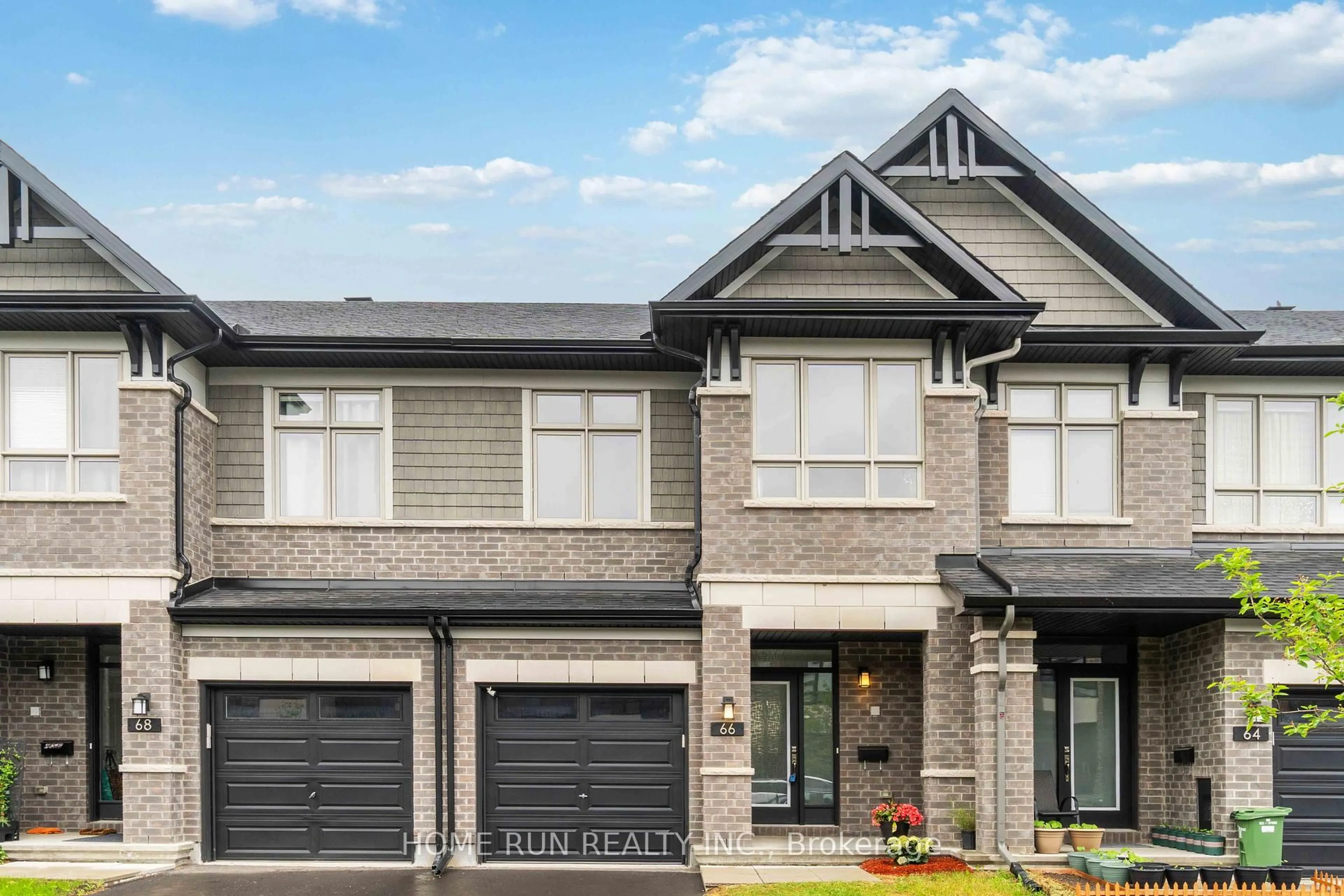 Home with brick exterior material, street for 66 Canvasback Rdge, Ottawa Ontario K4M 0P6