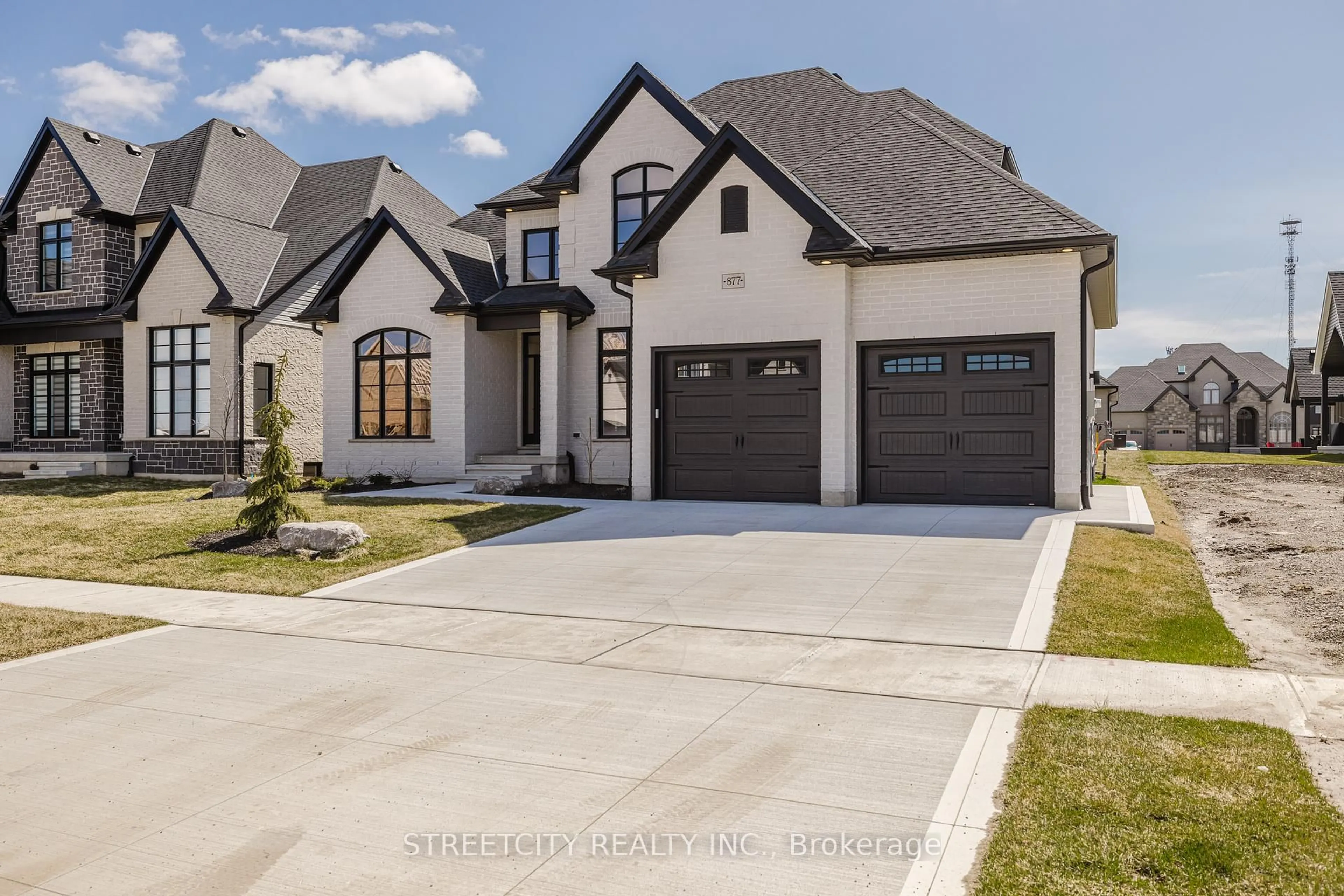 Home with brick exterior material, street for 877 Eagletrace Dr, London North Ontario N6G 3X9