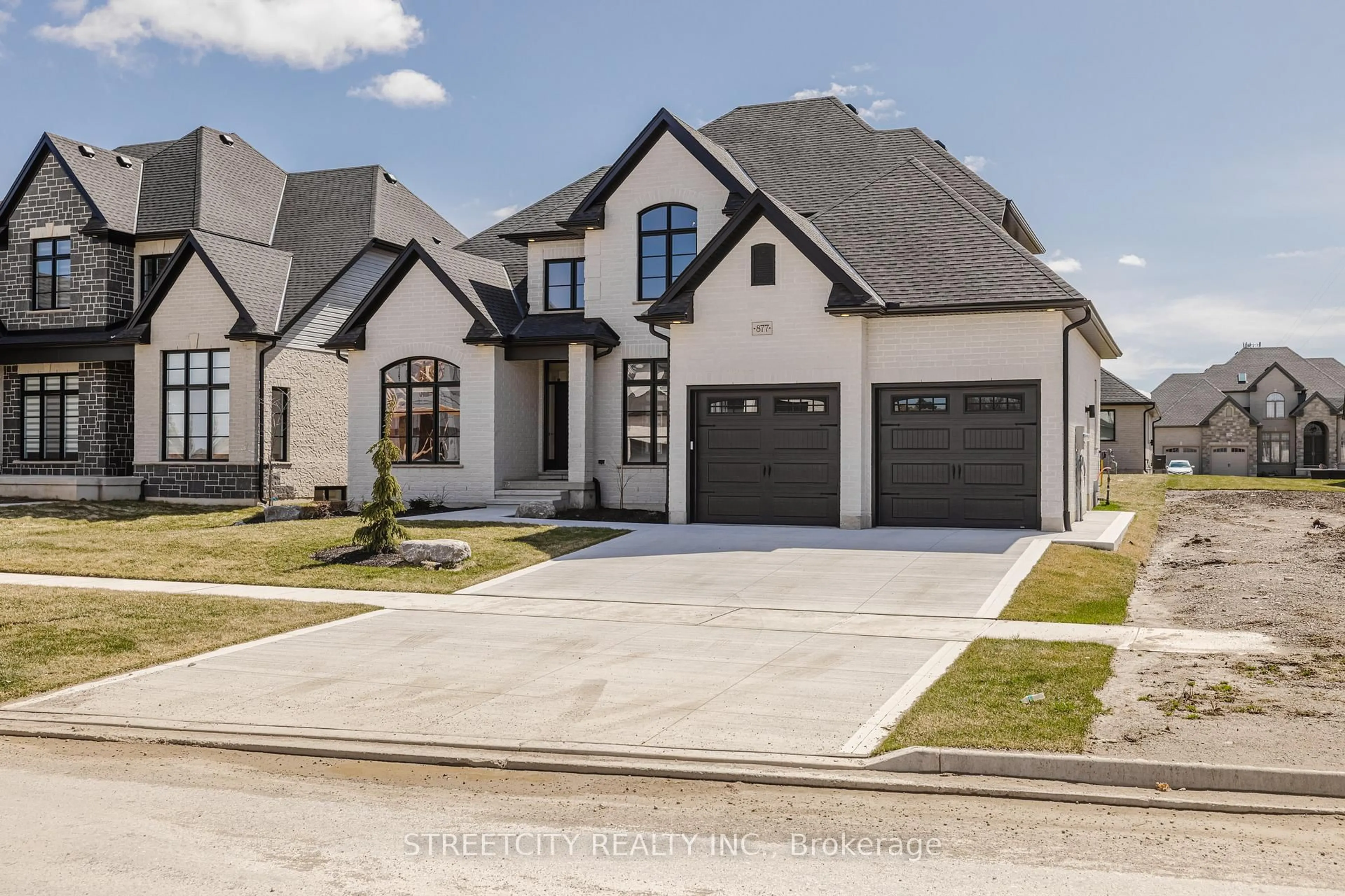 Home with brick exterior material, street for 877 Eagletrace Dr, London North Ontario N6G 3X9