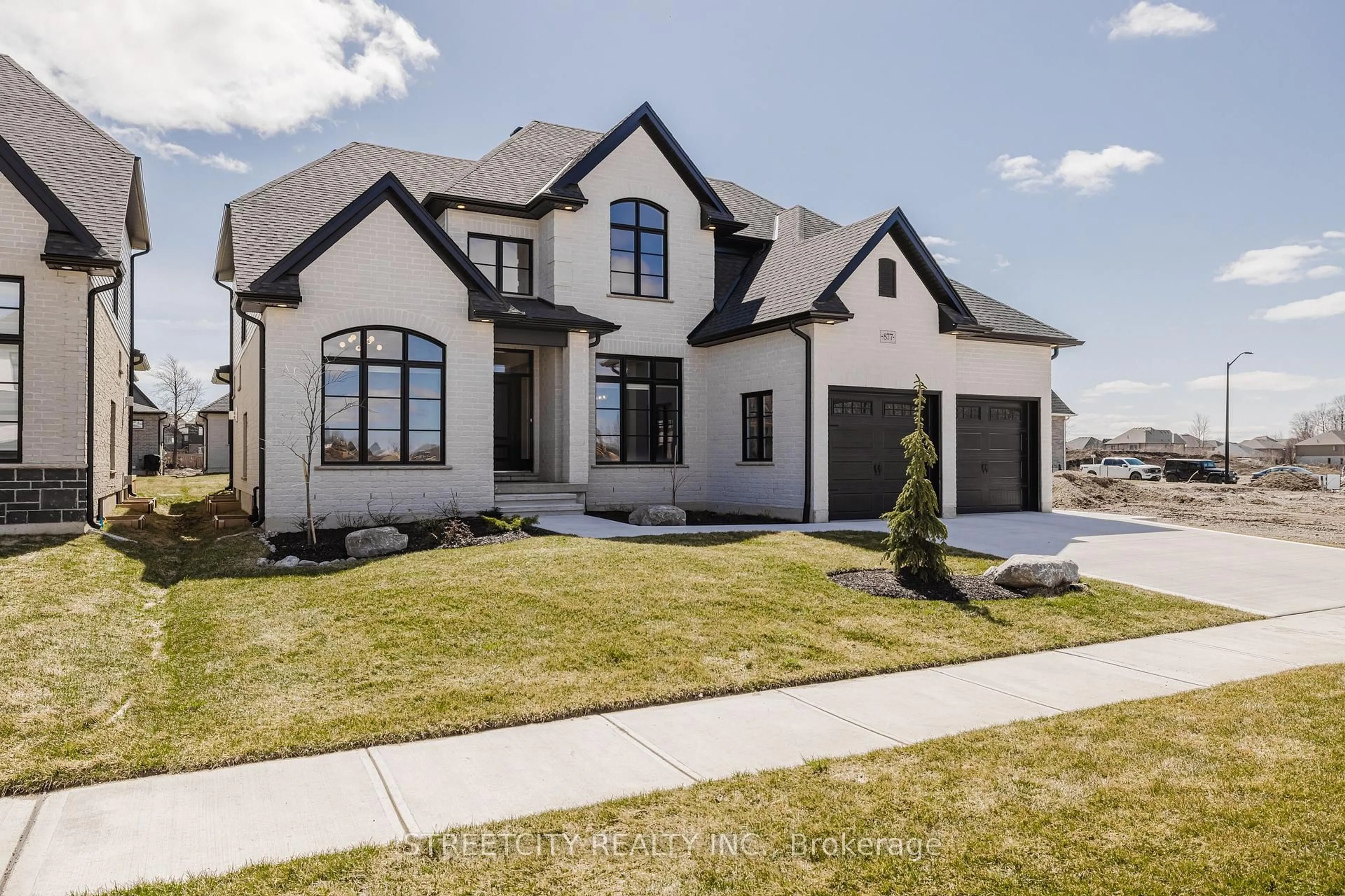 Home with brick exterior material, street for 877 Eagletrace Dr, London North Ontario N6G 3X9
