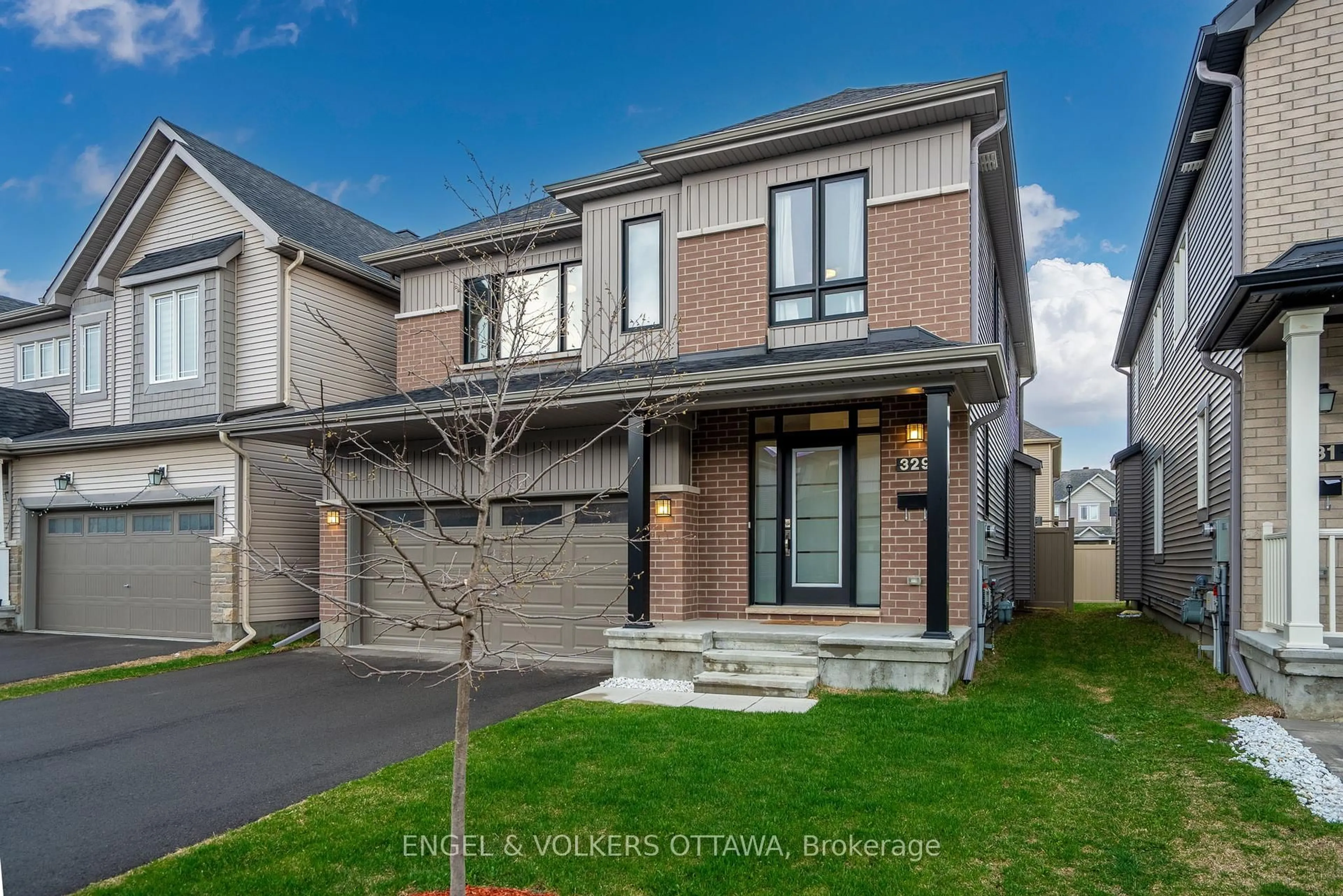 Home with brick exterior material, street for 329 Finial Way, Ottawa Ontario K2J 6V9