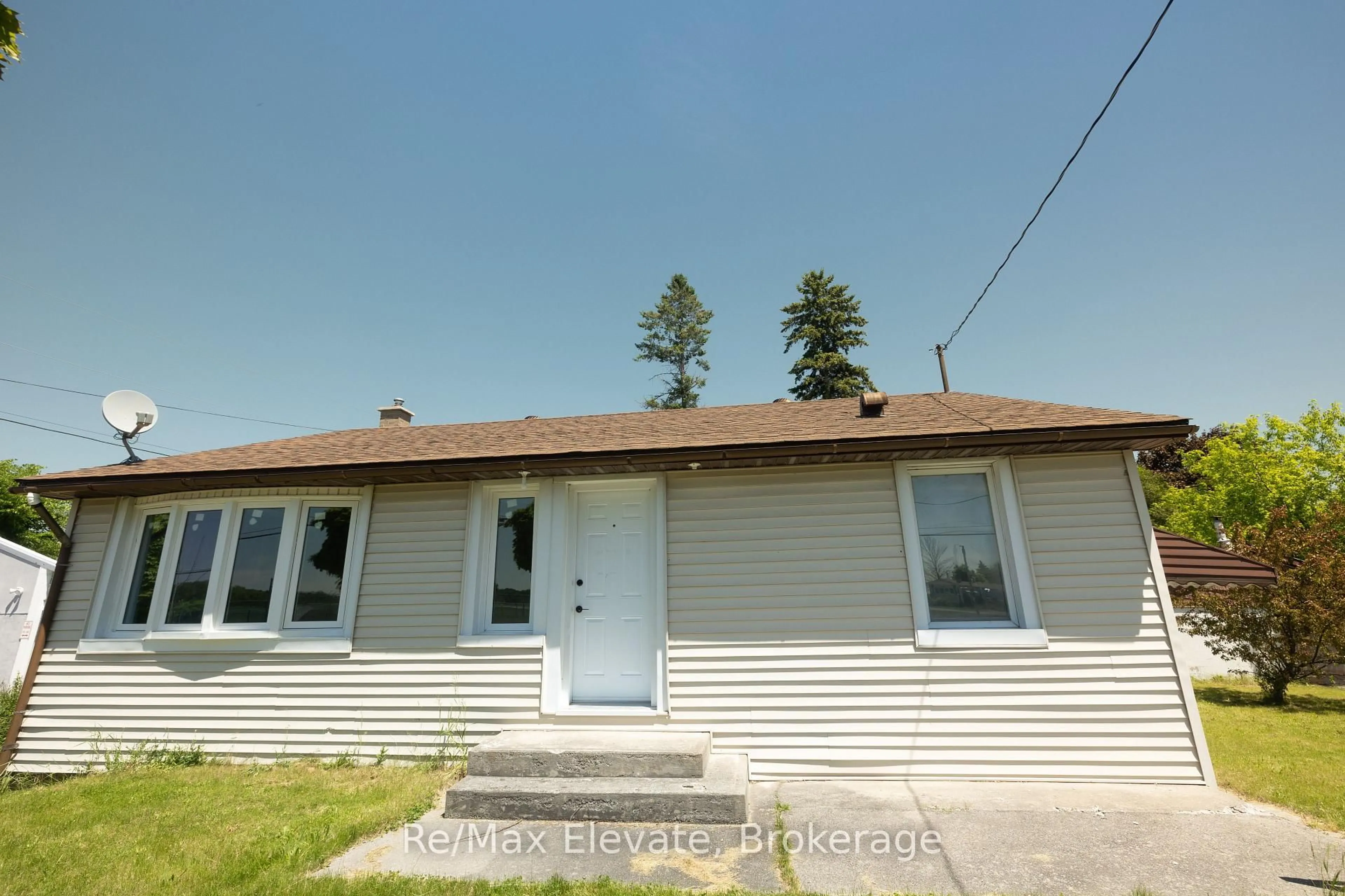 A pic from outside/outdoor area/front of a property/back of a property/a pic from drone, street for 106 Whites Rd, Quinte West Ontario K8V 5P5
