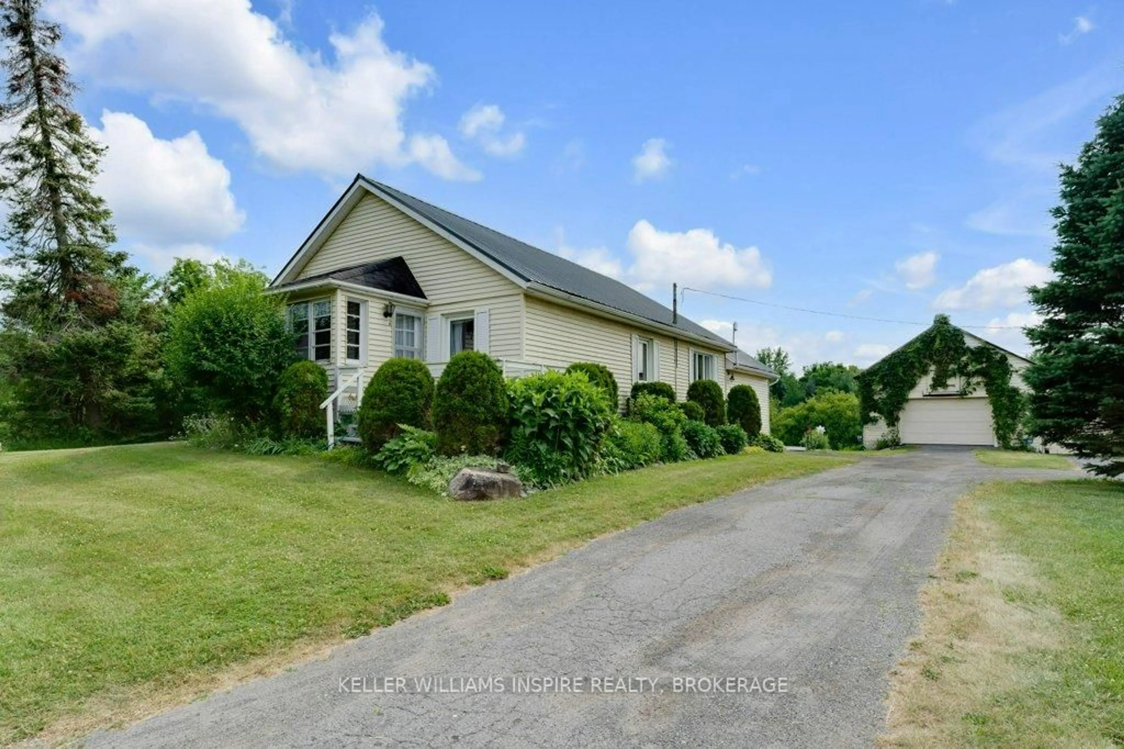 A pic from outside/outdoor area/front of a property/back of a property/a pic from drone, street for 1598 County Rd 6 Rd, Bissett Creek Ontario K0H 2H0