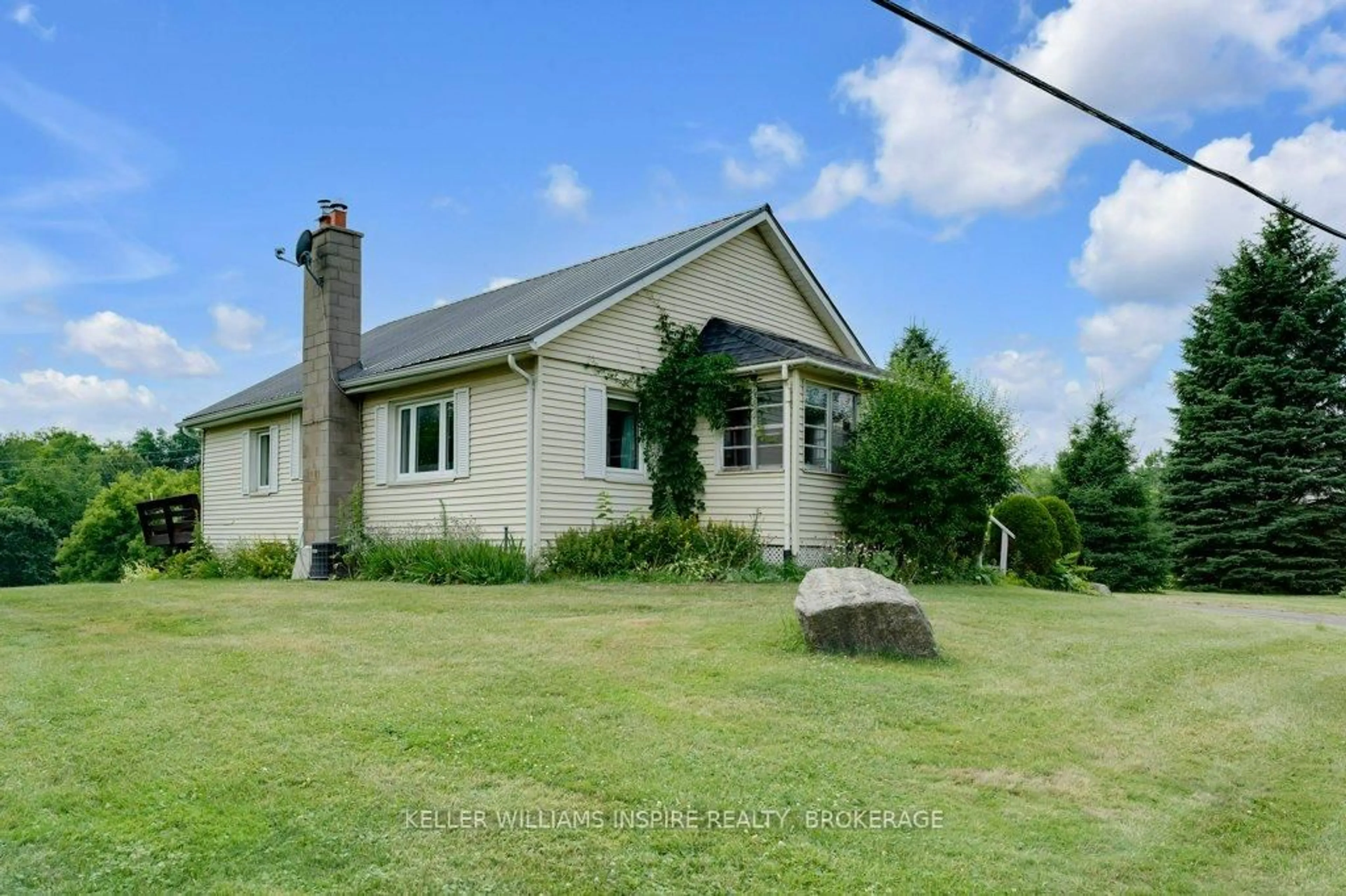A pic from outside/outdoor area/front of a property/back of a property/a pic from drone, building for 1598 County Rd 6 Rd, Bissett Creek Ontario K0H 2H0