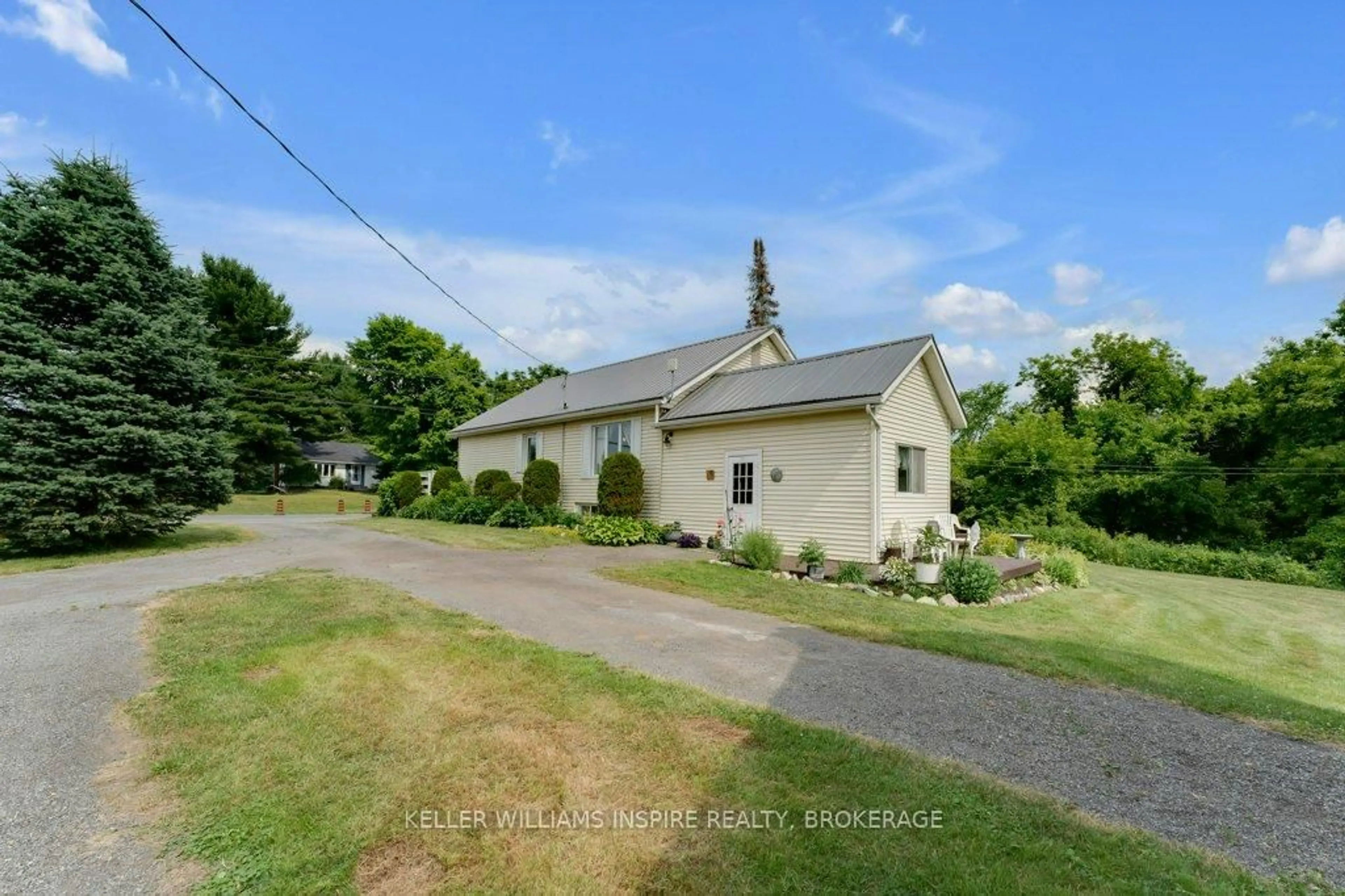 A pic from outside/outdoor area/front of a property/back of a property/a pic from drone, unknown for 1598 County Rd 6 Rd, Bissett Creek Ontario K0H 2H0