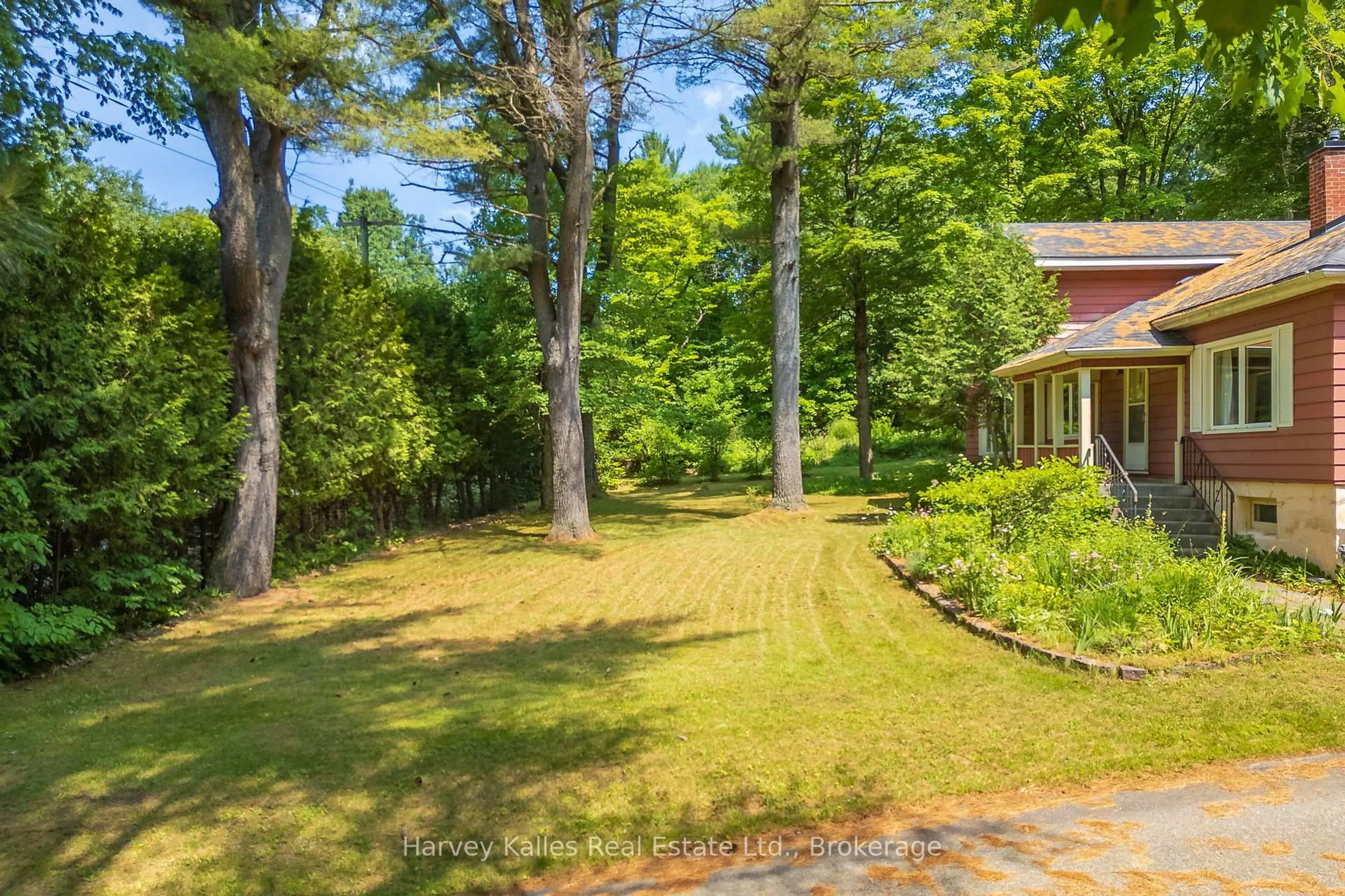 Patio, forest/trees view for 835 Muskoka Road 3, Huntsville Ontario P1H 1E1