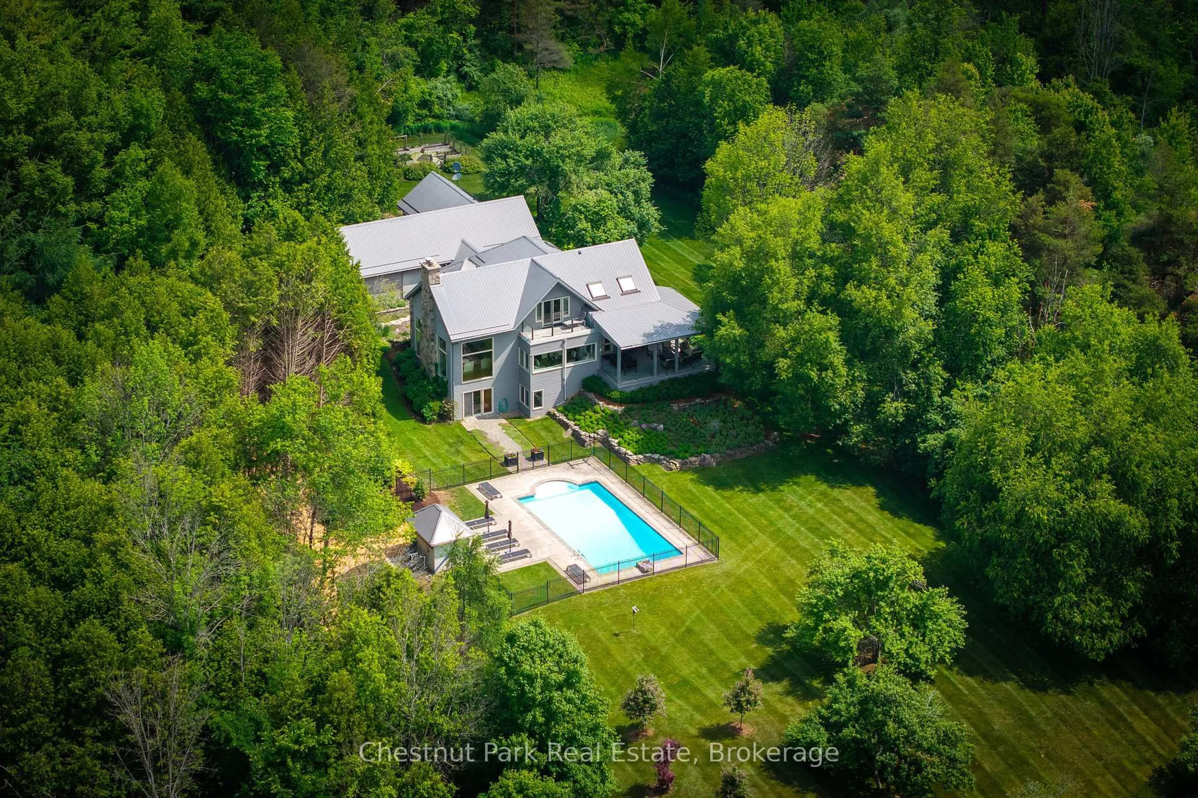 A pic from outside/outdoor area/front of a property/back of a property/a pic from drone, water/lake/river/ocean view for 798251 3rd Line, Mulmur Ontario L9V 0H7