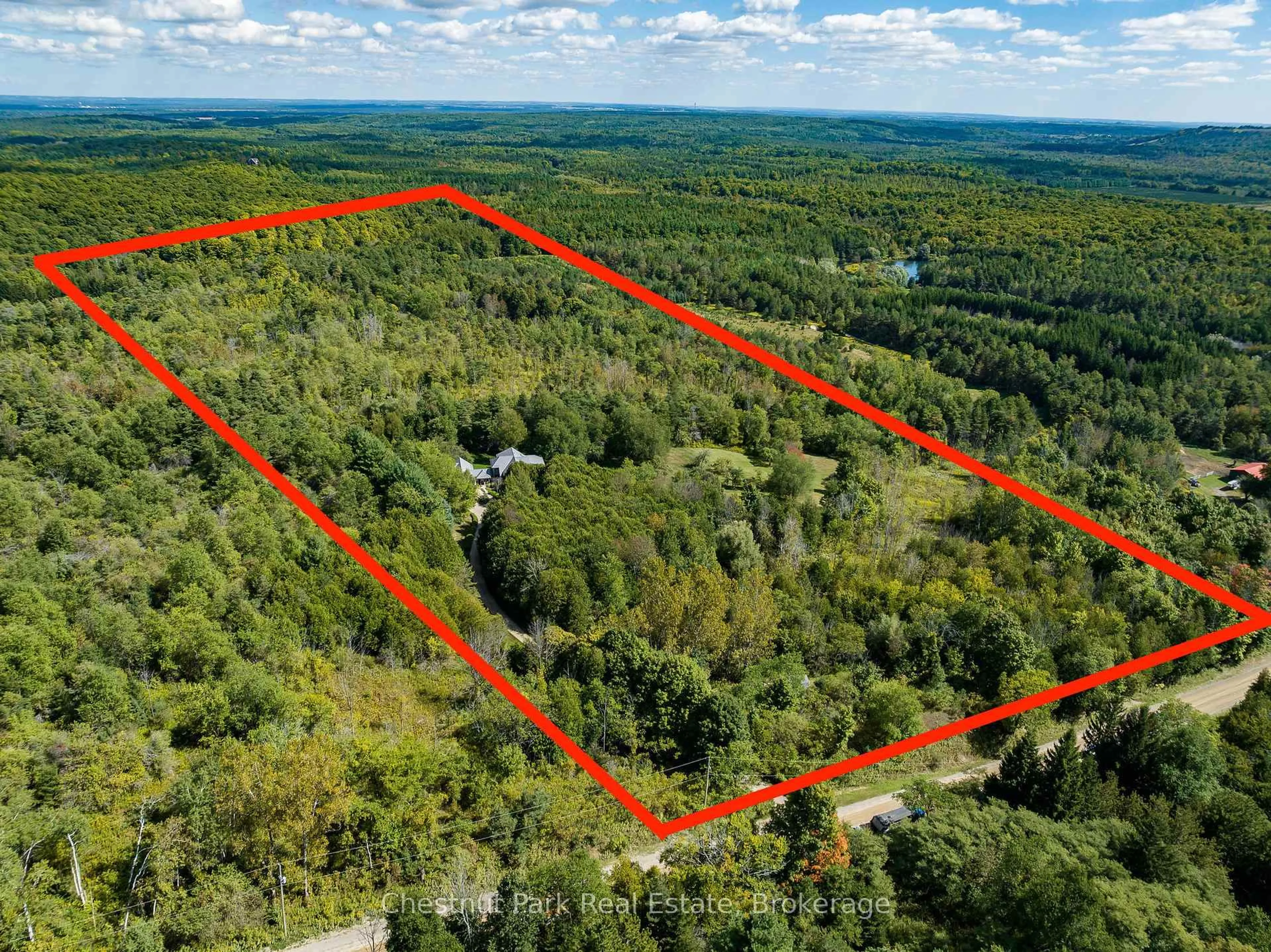 A pic from outside/outdoor area/front of a property/back of a property/a pic from drone, forest/trees view for 798251 3rd Line, Mulmur Ontario L9V 0H7