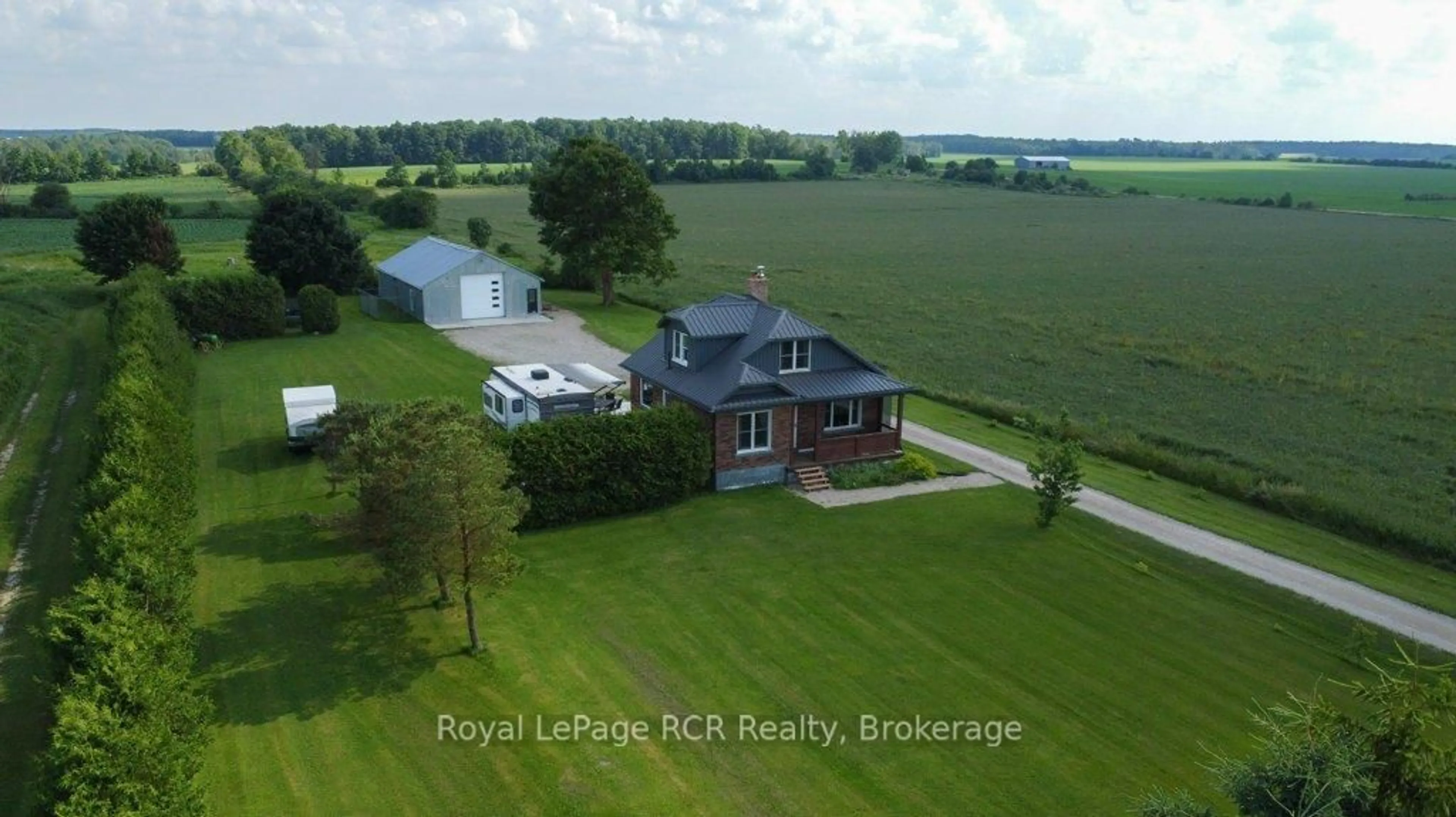 A pic from outside/outdoor area/front of a property/back of a property/a pic from drone, water/lake/river/ocean view for 8321 Highway 89, Wellington North Ontario N0G 1N0
