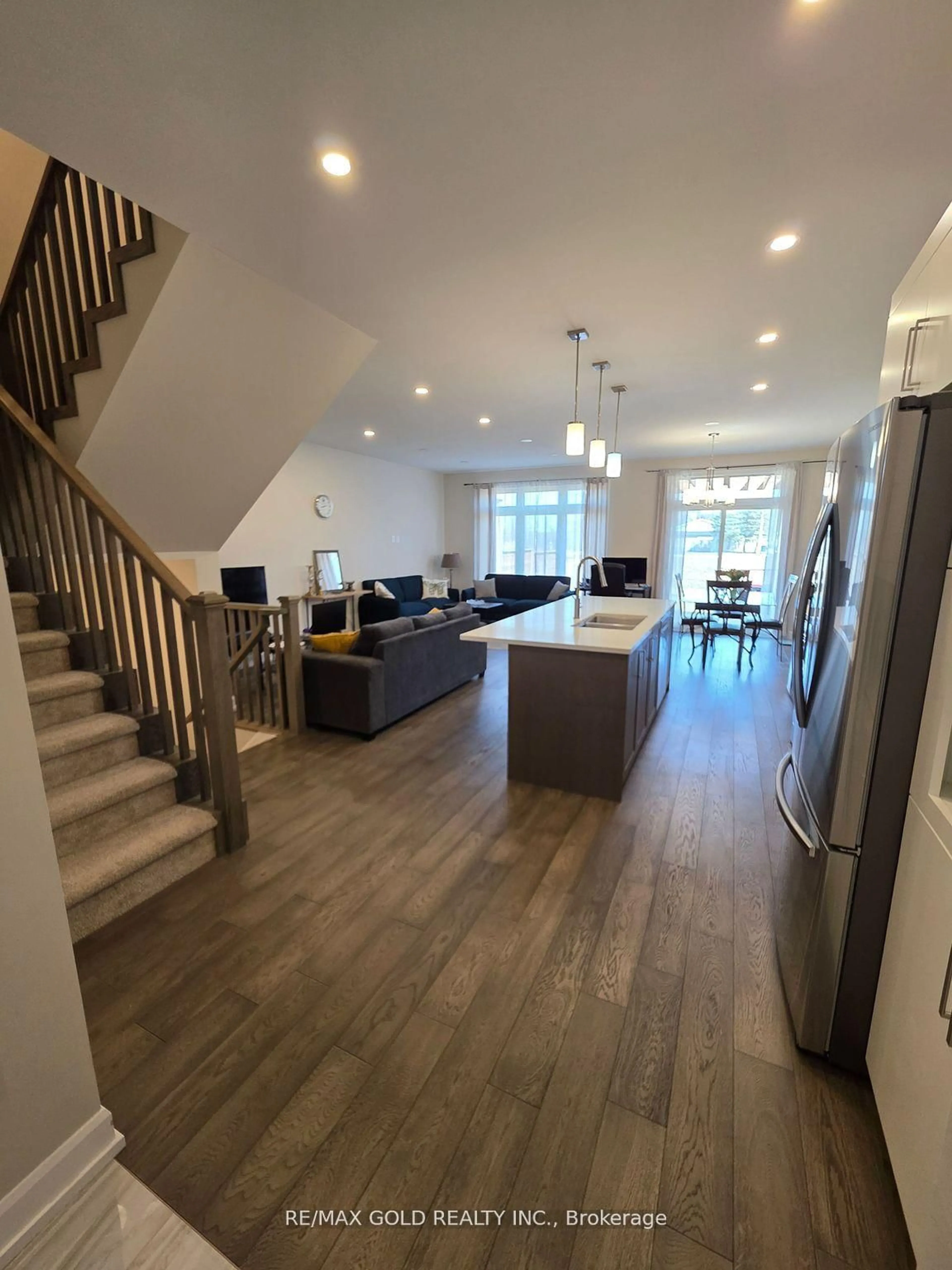 Open concept kitchen, wood/laminate floor for 7154 Parsa St, Niagara Falls Ontario L2H 3T1