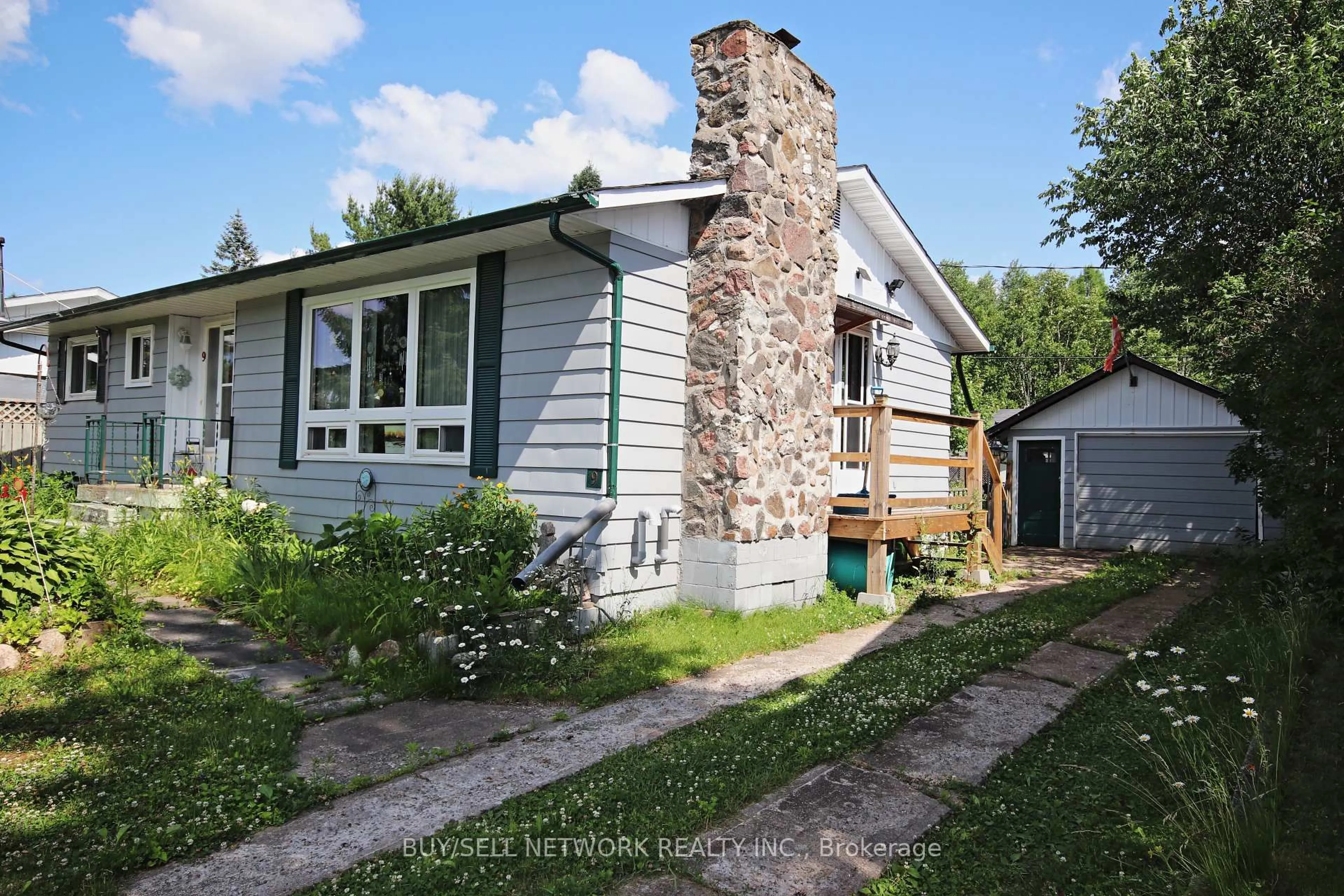 Home with vinyl exterior material, street for 9 Hemlock St, Highlands East Ontario K0L 1M0