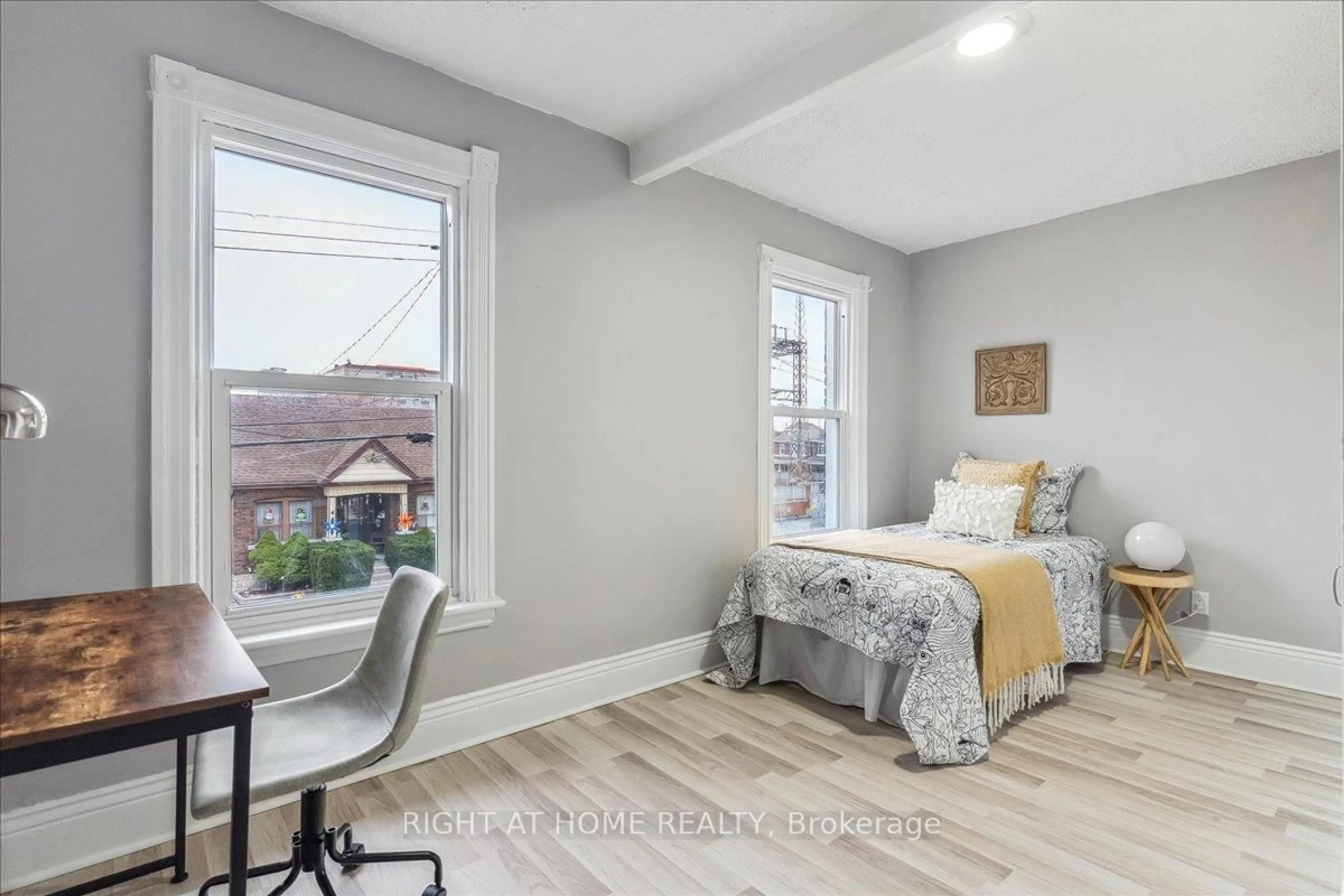 Bedroom with bed, wood/laminate floor for 16 Birch Ave, Hamilton Ontario L8L 6H3