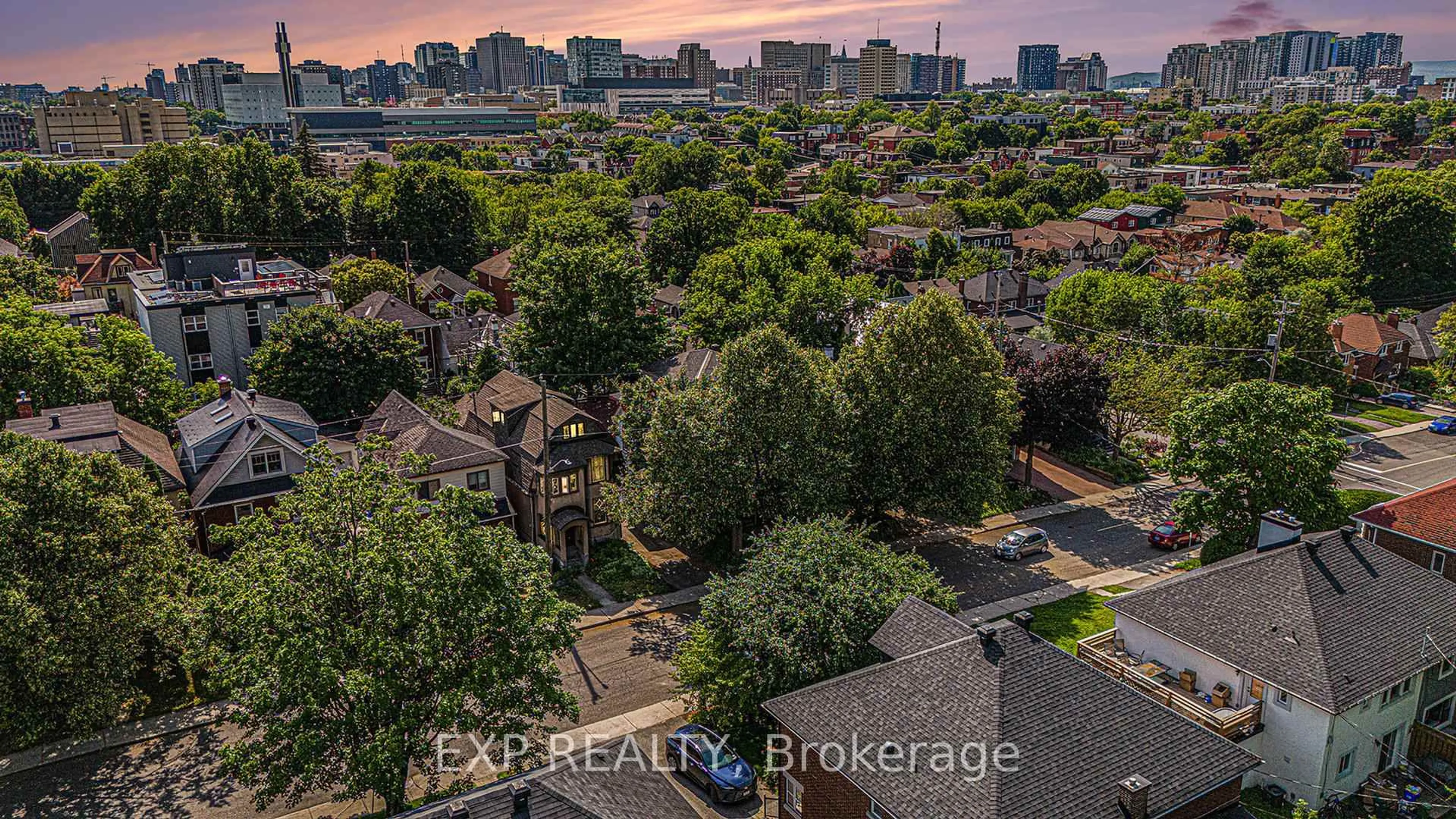 A pic from outside/outdoor area/front of a property/back of a property/a pic from drone, city buildings view from balcony for 210 Blackburn Ave, Ottawa Ontario K1N 8A8
