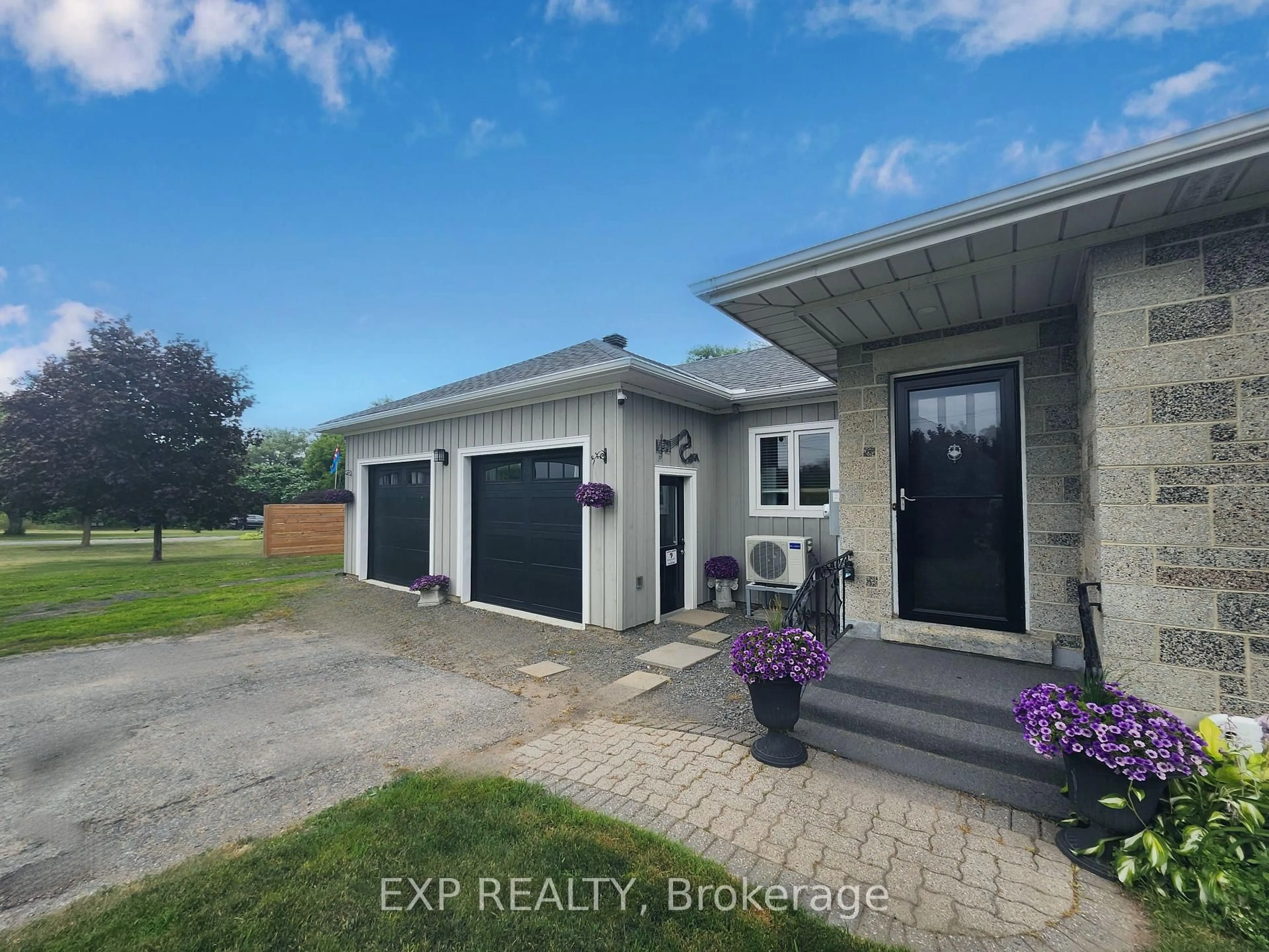 A pic from outside/outdoor area/front of a property/back of a property/a pic from drone, street for 1433 County Rd 2 Rd, Augusta Ontario K0E 1T0