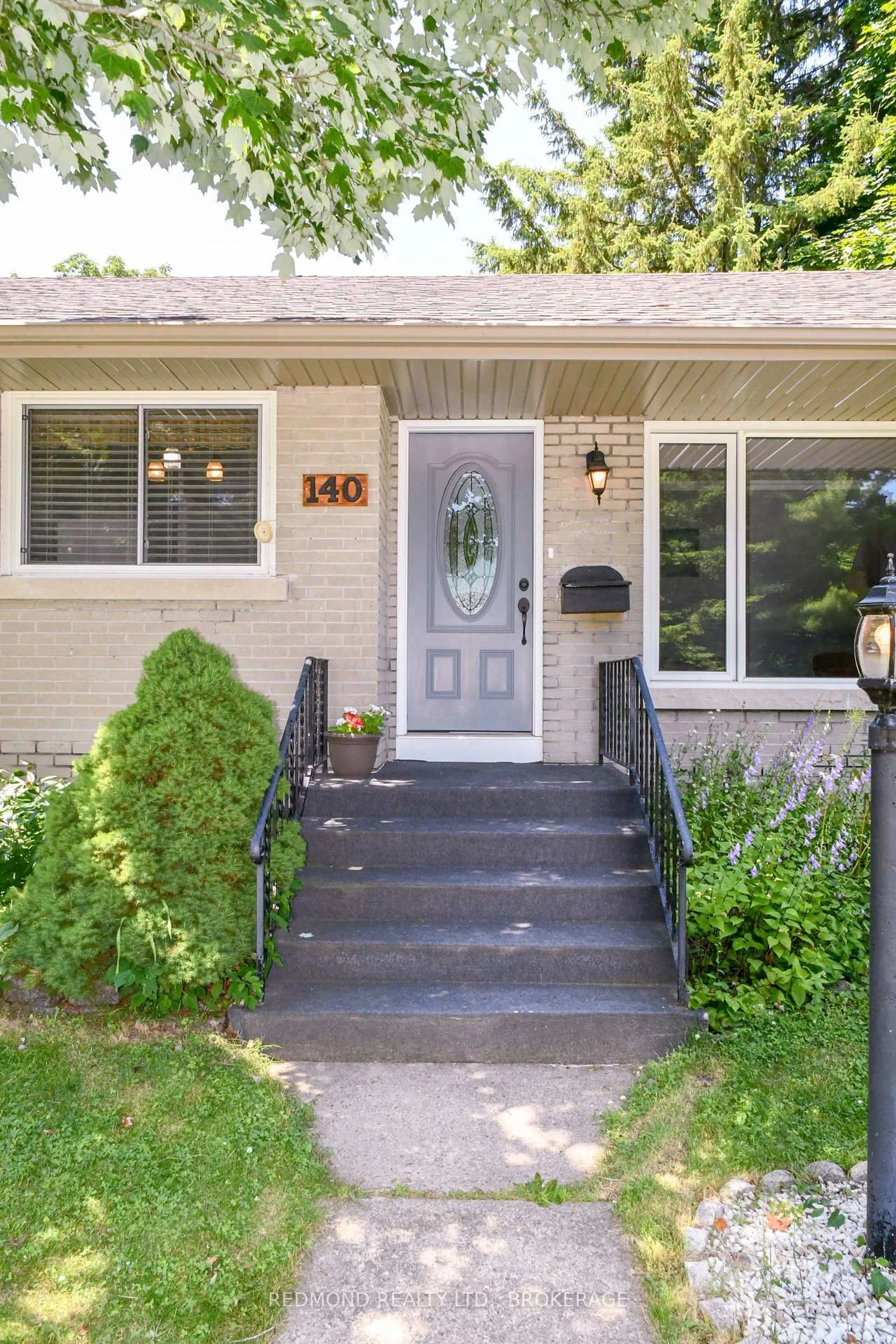 Home with vinyl exterior material, street for 140 BROCK St, Gananoque Ontario K7G 1K2