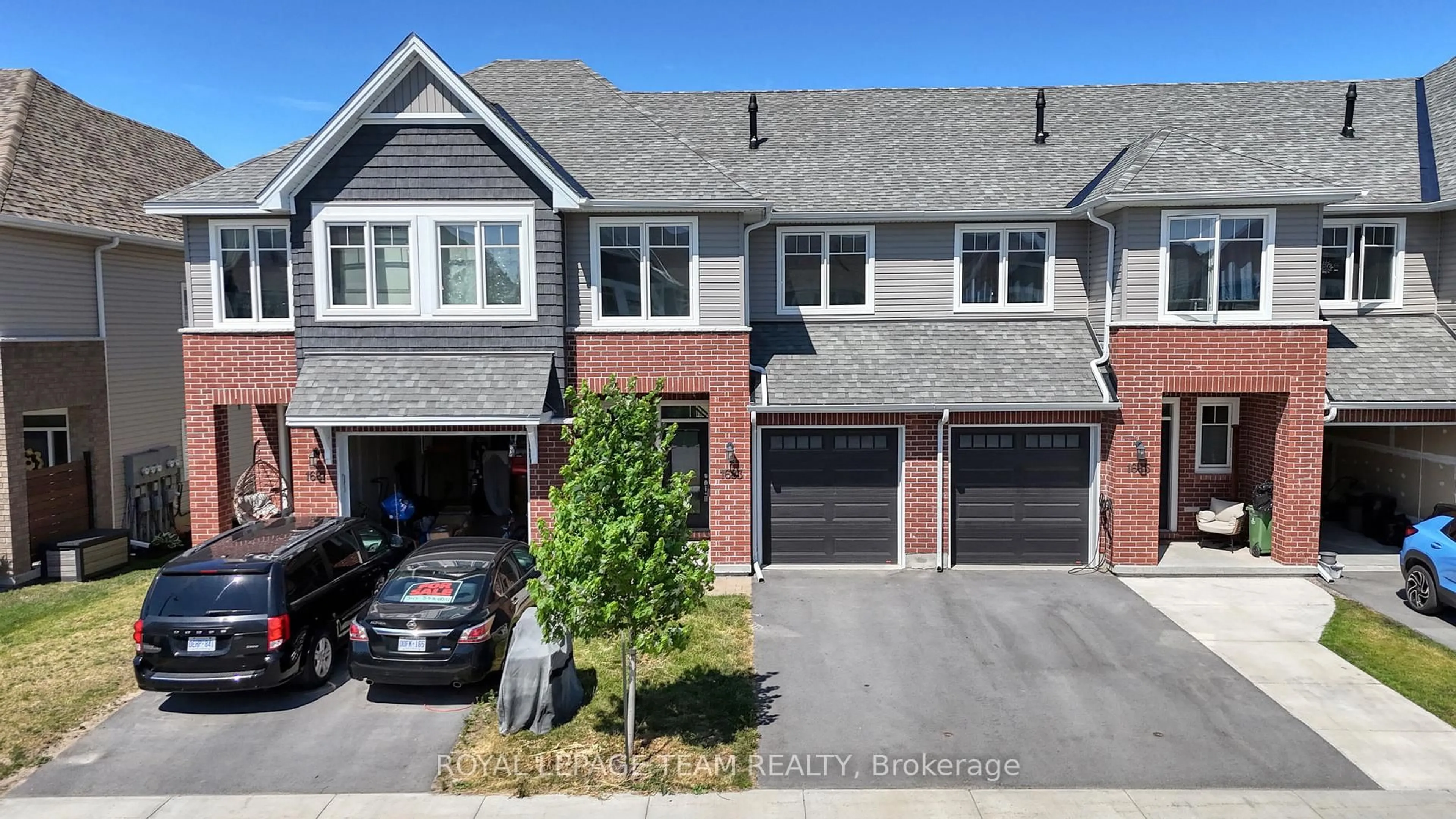 A pic from outside/outdoor area/front of a property/back of a property/a pic from drone, street for 1683 Tenley Dr, Kingston Ontario K7P 0S4