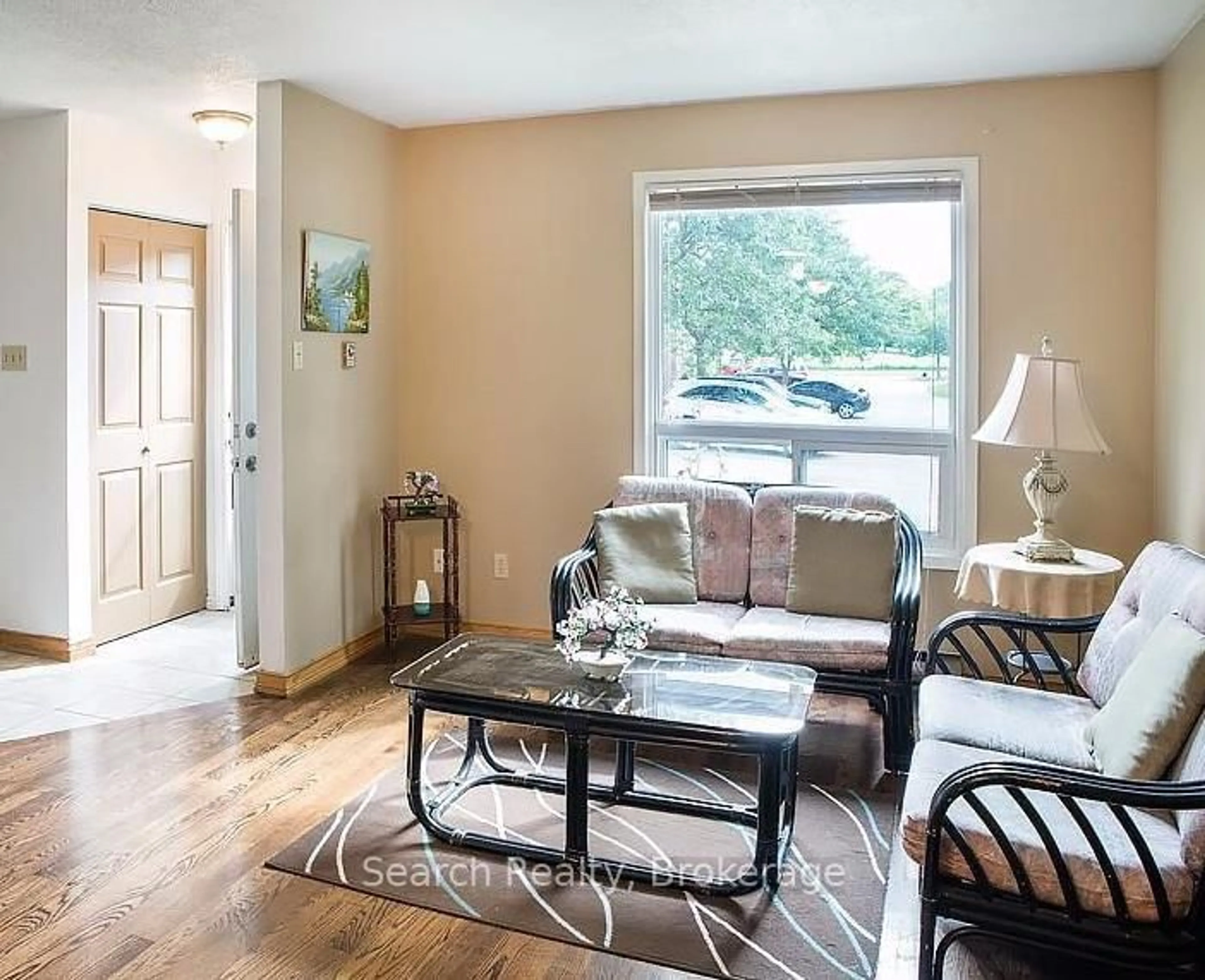 Living room with furniture, wood/laminate floor for 311 Vesta Rd #29, London East Ontario N5Y 5J1