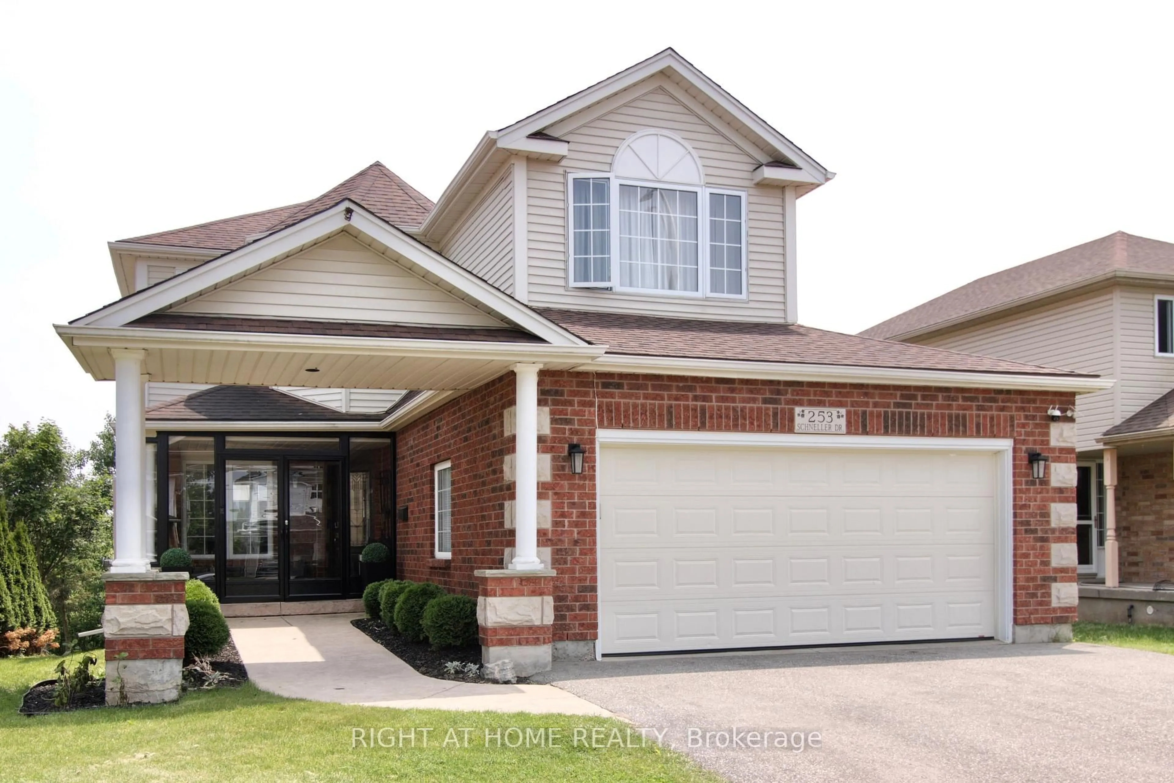 Home with brick exterior material, street for 253 Schneller Dr, Wilmot Ontario N3A 2K9