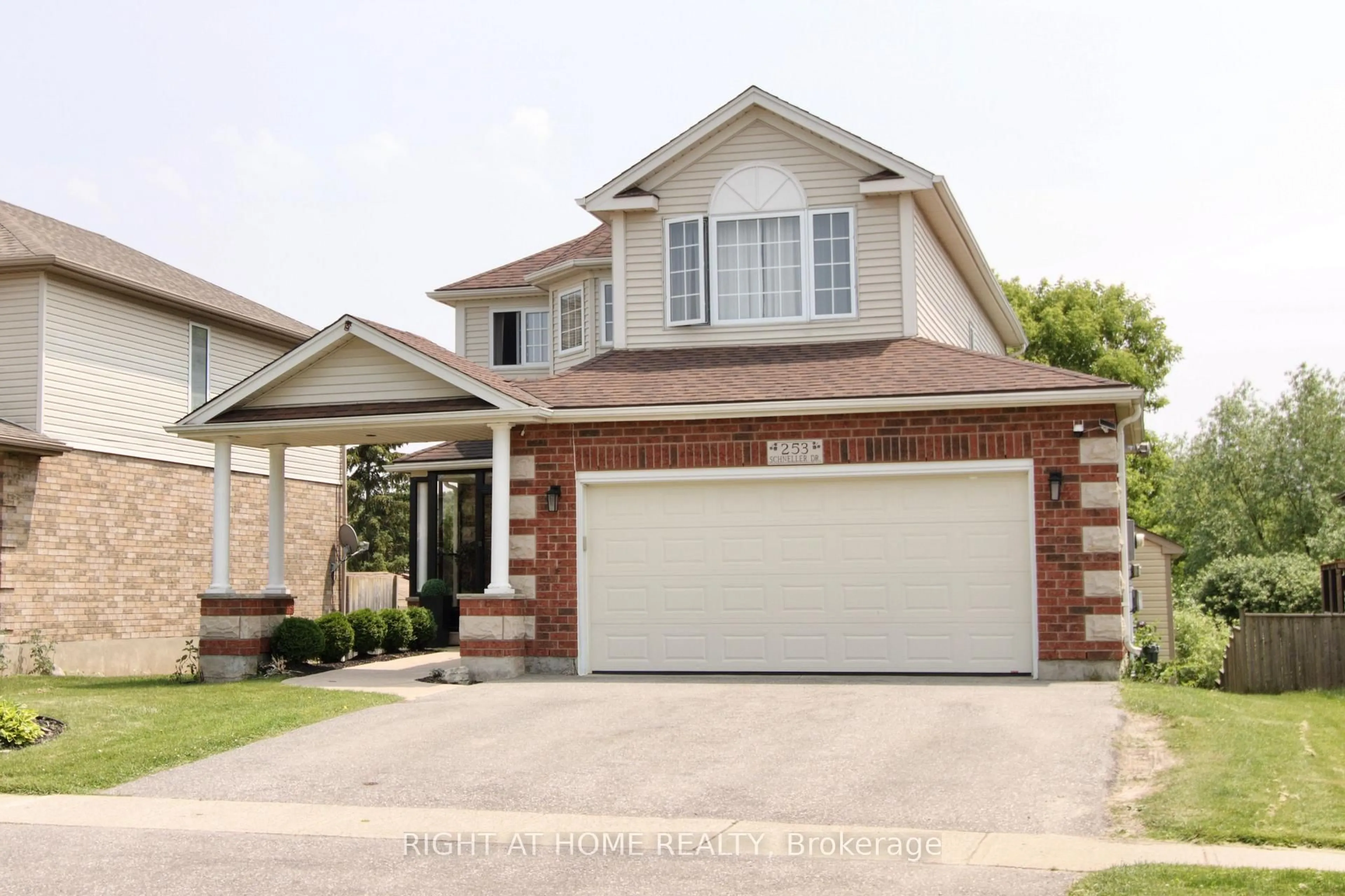 Home with brick exterior material, street for 253 Schneller Dr, Wilmot Ontario N3A 2K9