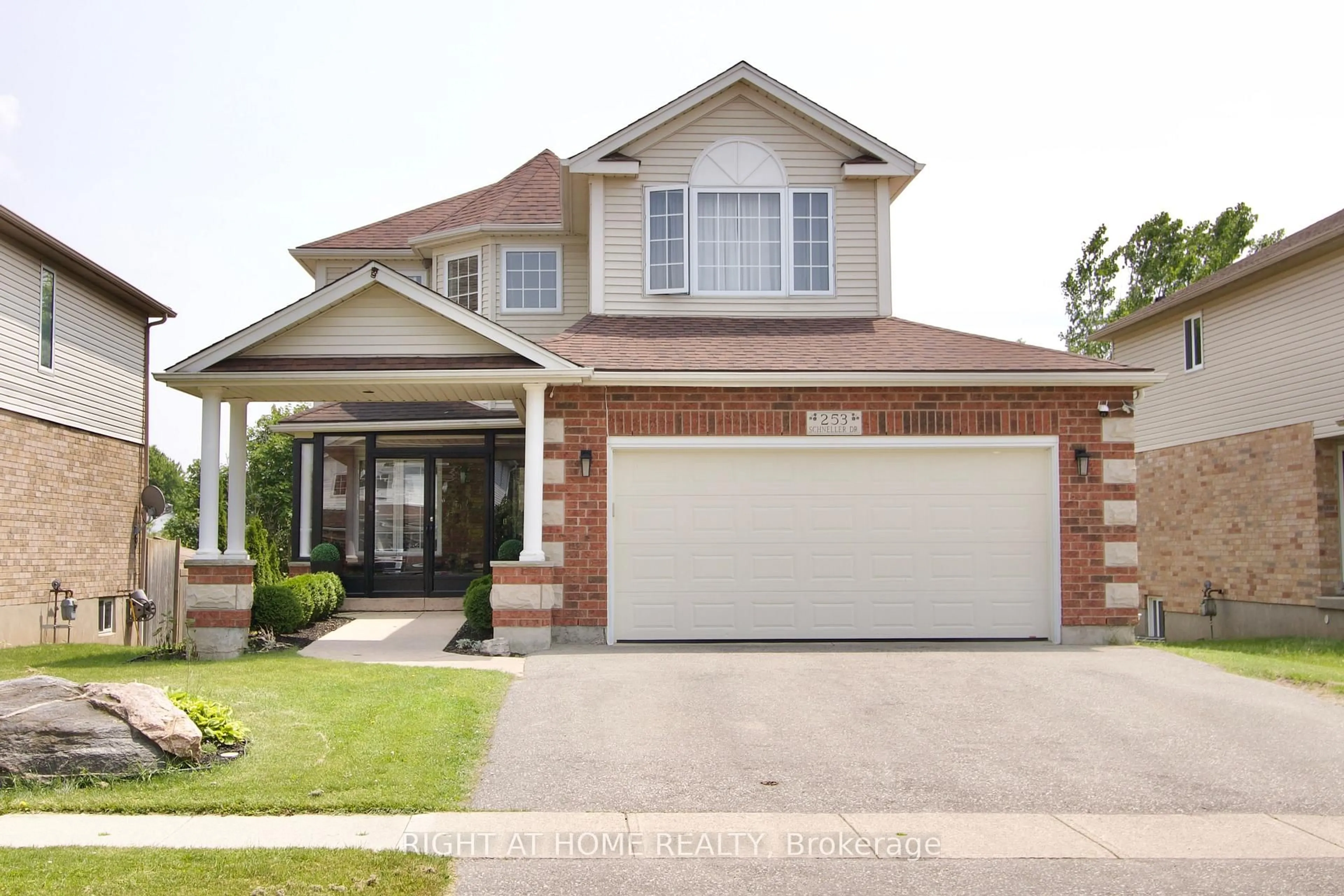 Home with brick exterior material, street for 253 Schneller Dr, Wilmot Ontario N3A 2K9