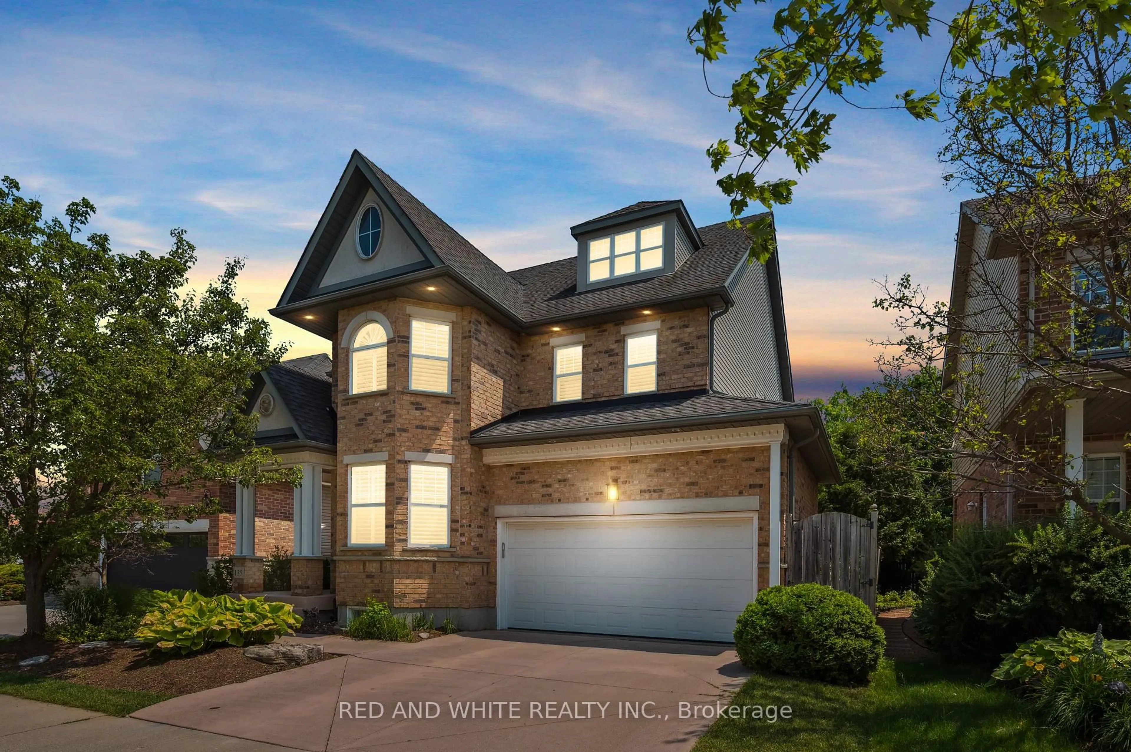 Home with brick exterior material, street for 135 Hawkswood Dr, Kitchener Ontario N2K 4J4