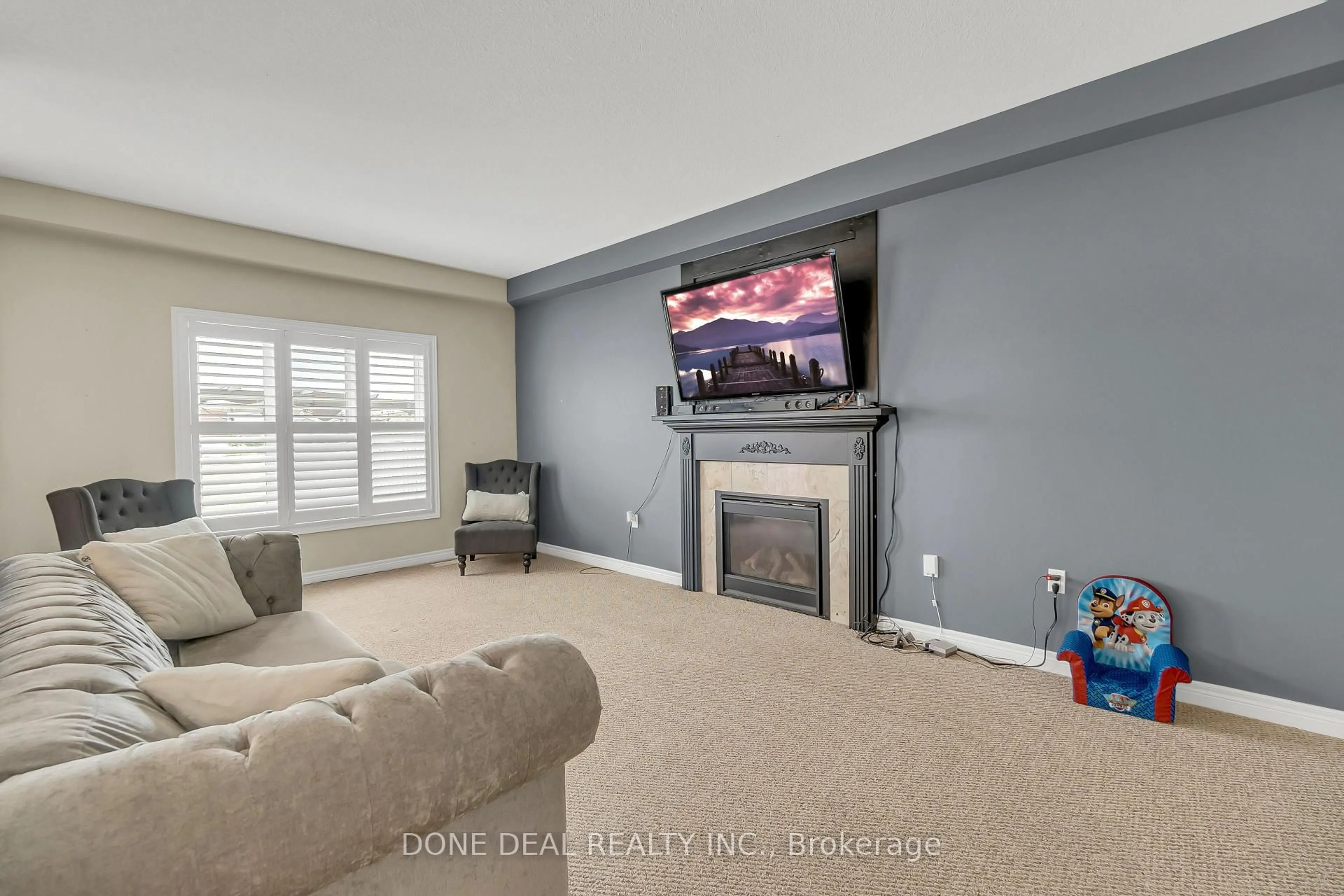 Living room with furniture, unknown for 109 Showcase Dr, Hamilton Ontario L0R 1P0