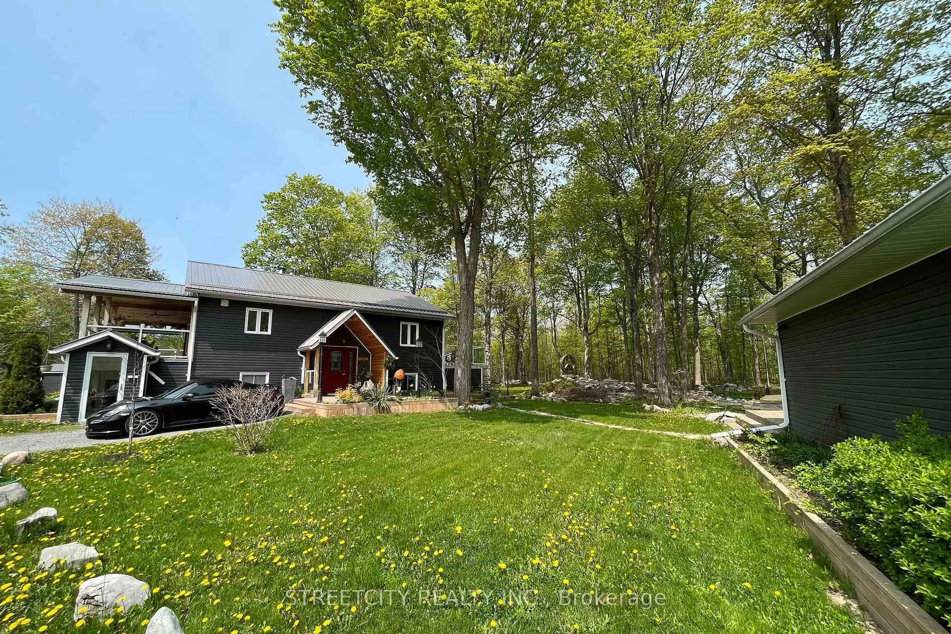 A pic from outside/outdoor area/front of a property/back of a property/a pic from drone, forest/trees view for 171 Flatrock Rd, Belleville Ontario K0K 2Y0