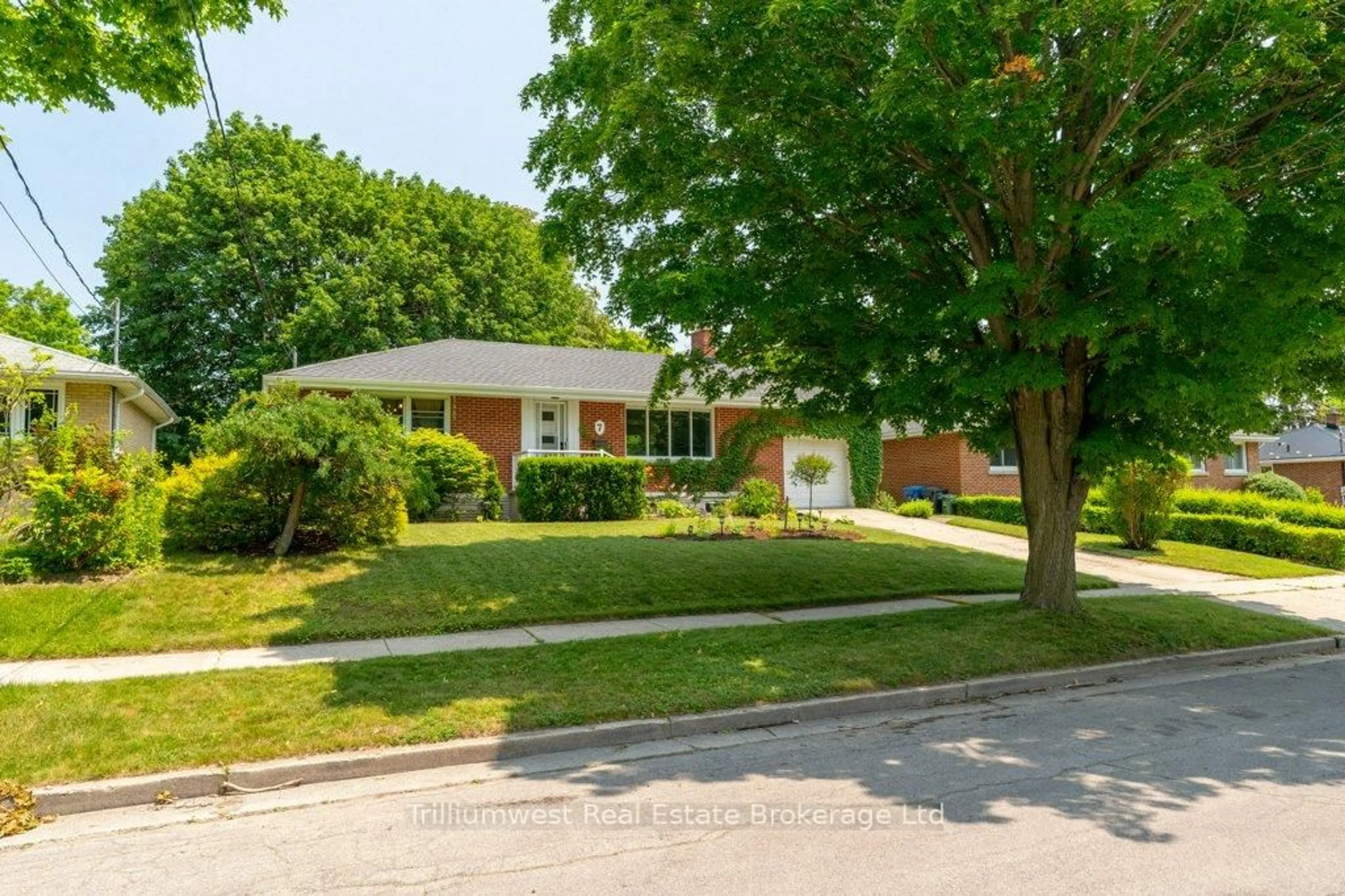 Home with brick exterior material, street for 7 Hamel Ave, Guelph Ontario N1H 5L9