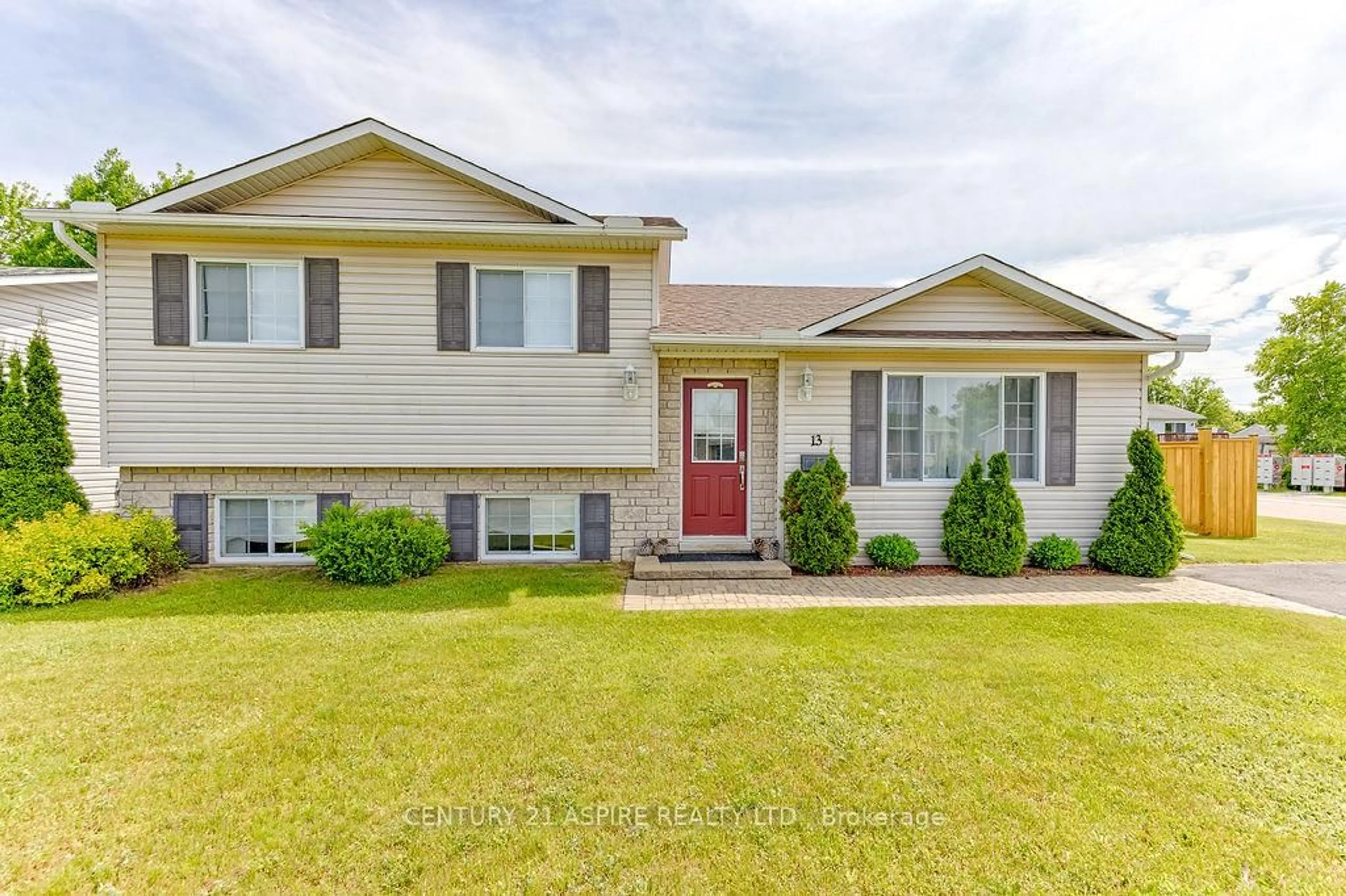 Home with vinyl exterior material, street for 13 Daniel Ave, Petawawa Ontario K8H 3P6