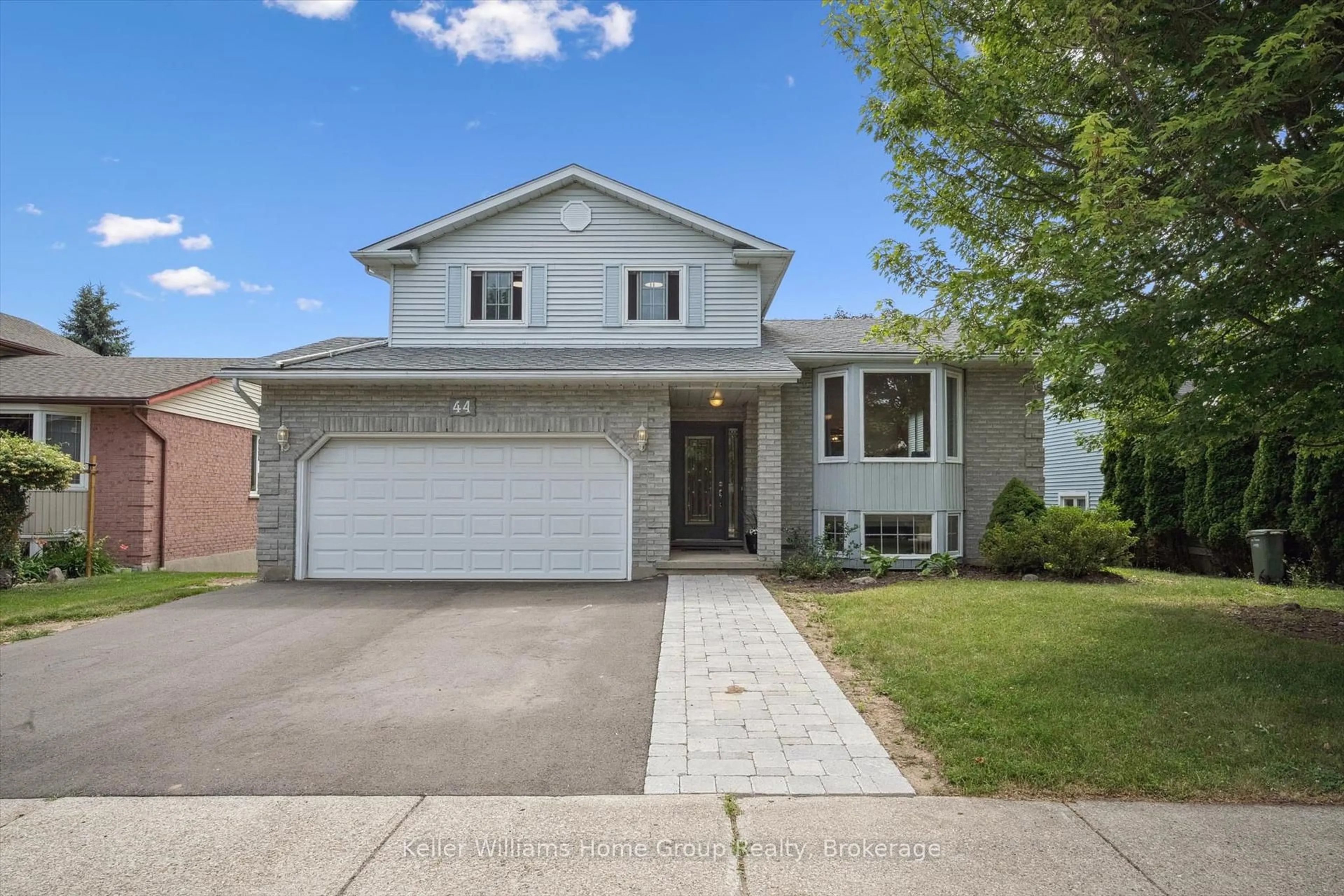 Home with vinyl exterior material, street for 44 Greenwich Dr, Guelph Ontario N1H 8C6