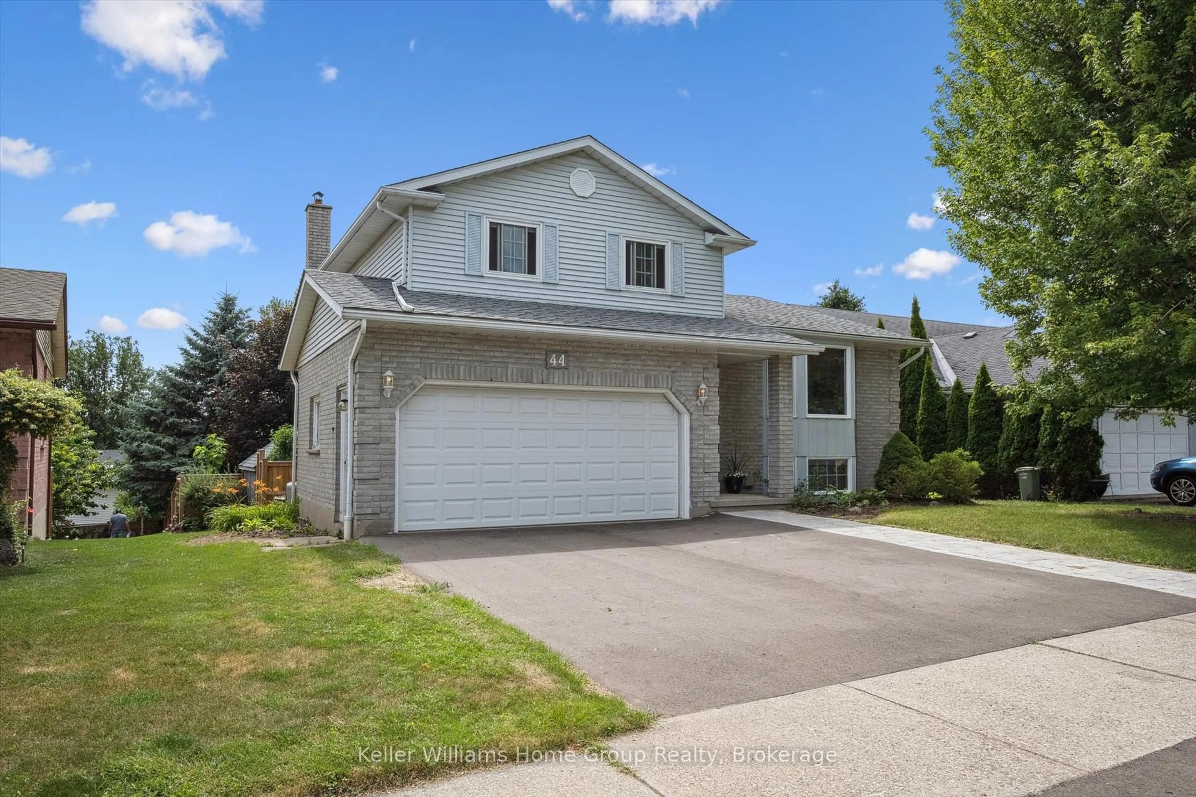 Home with vinyl exterior material, street for 44 Greenwich Dr, Guelph Ontario N1H 8C6