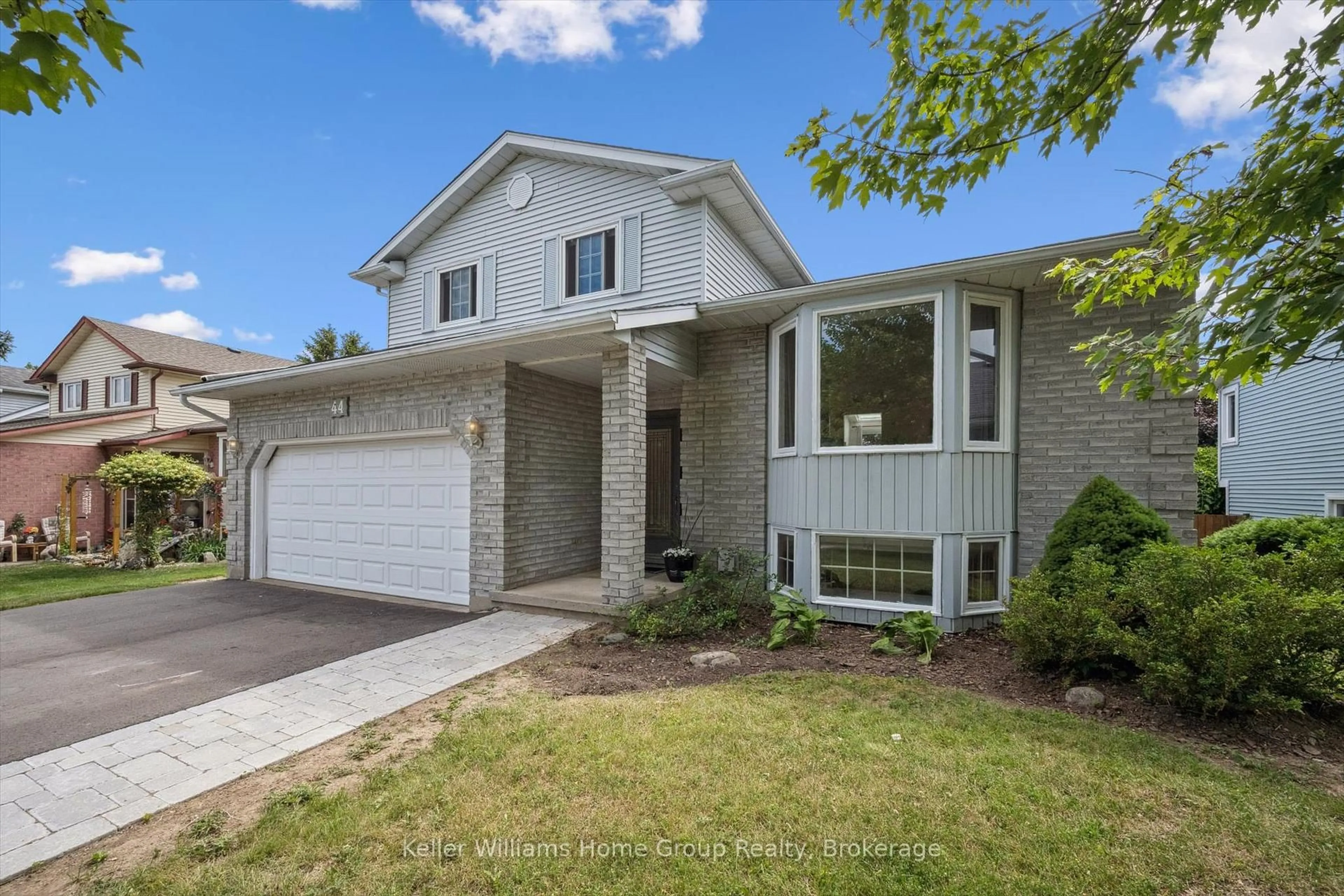 Home with brick exterior material, street for 44 Greenwich Dr, Guelph Ontario N1H 8C6