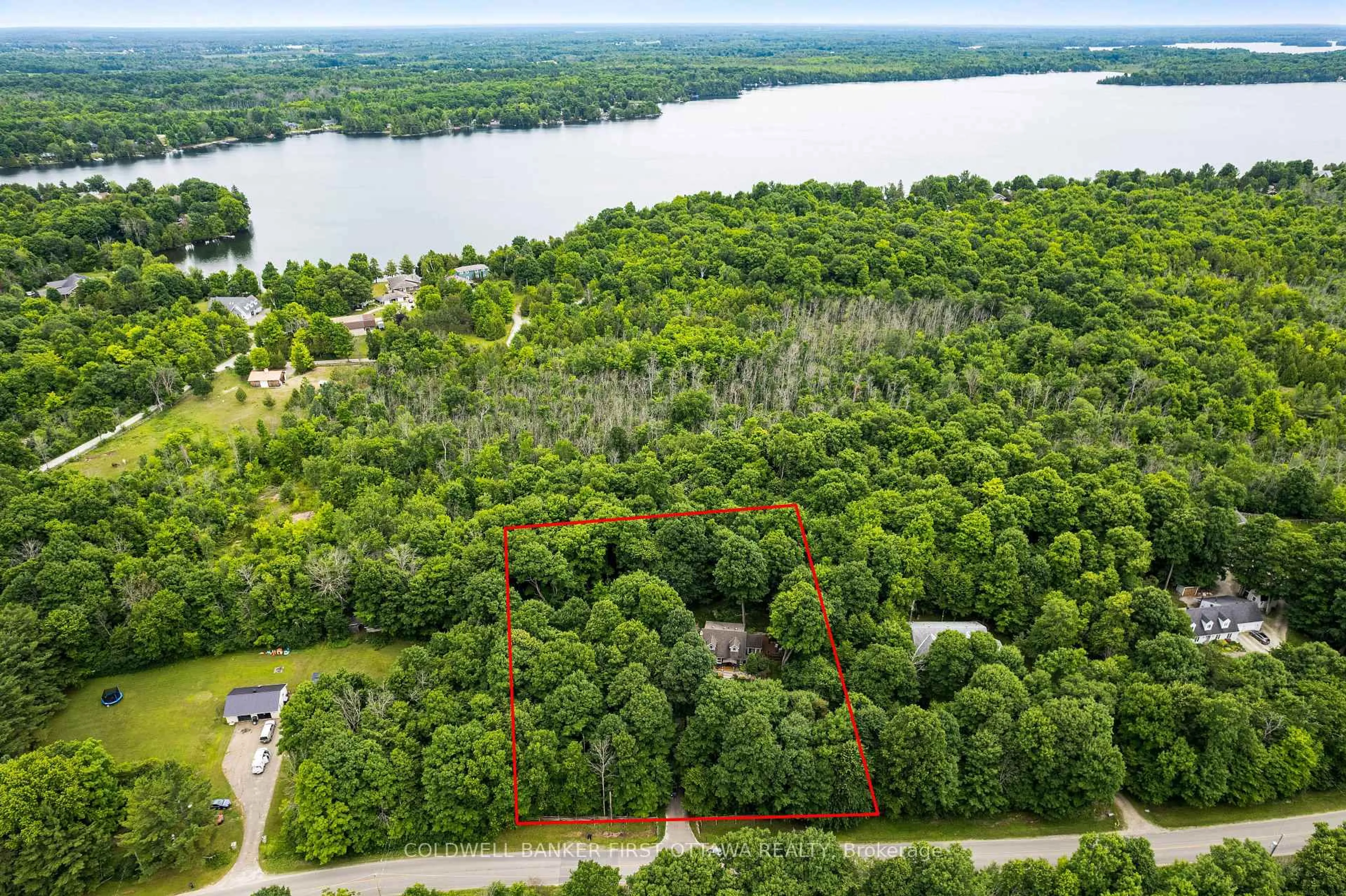 A pic from outside/outdoor area/front of a property/back of a property/a pic from drone, water/lake/river/ocean view for 99 Old Kingston Rd, Rideau Lakes Ontario K0G 1L0