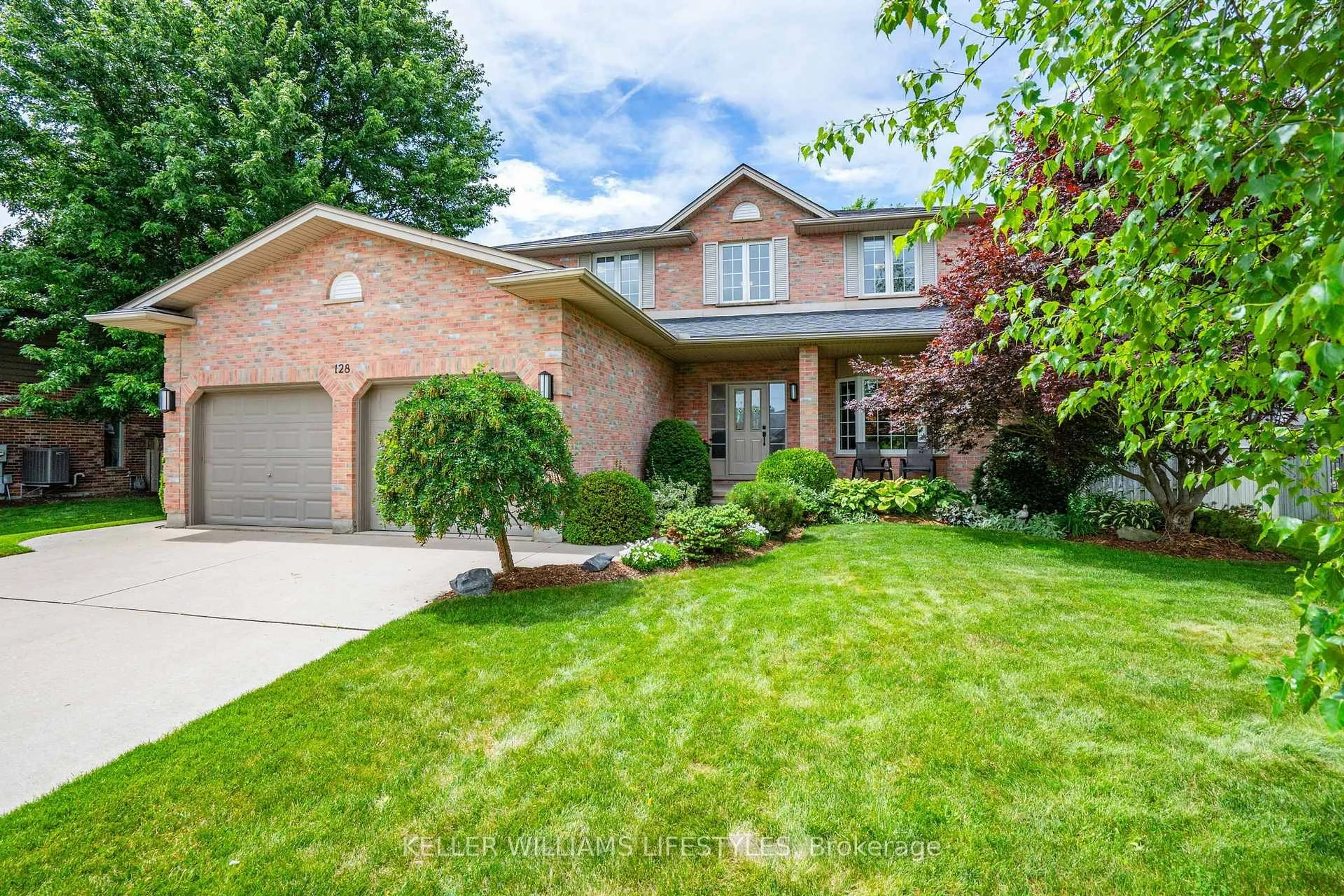 Home with brick exterior material, street for 128 Westbrook Dr, Middlesex Centre Ontario N0L 1R0