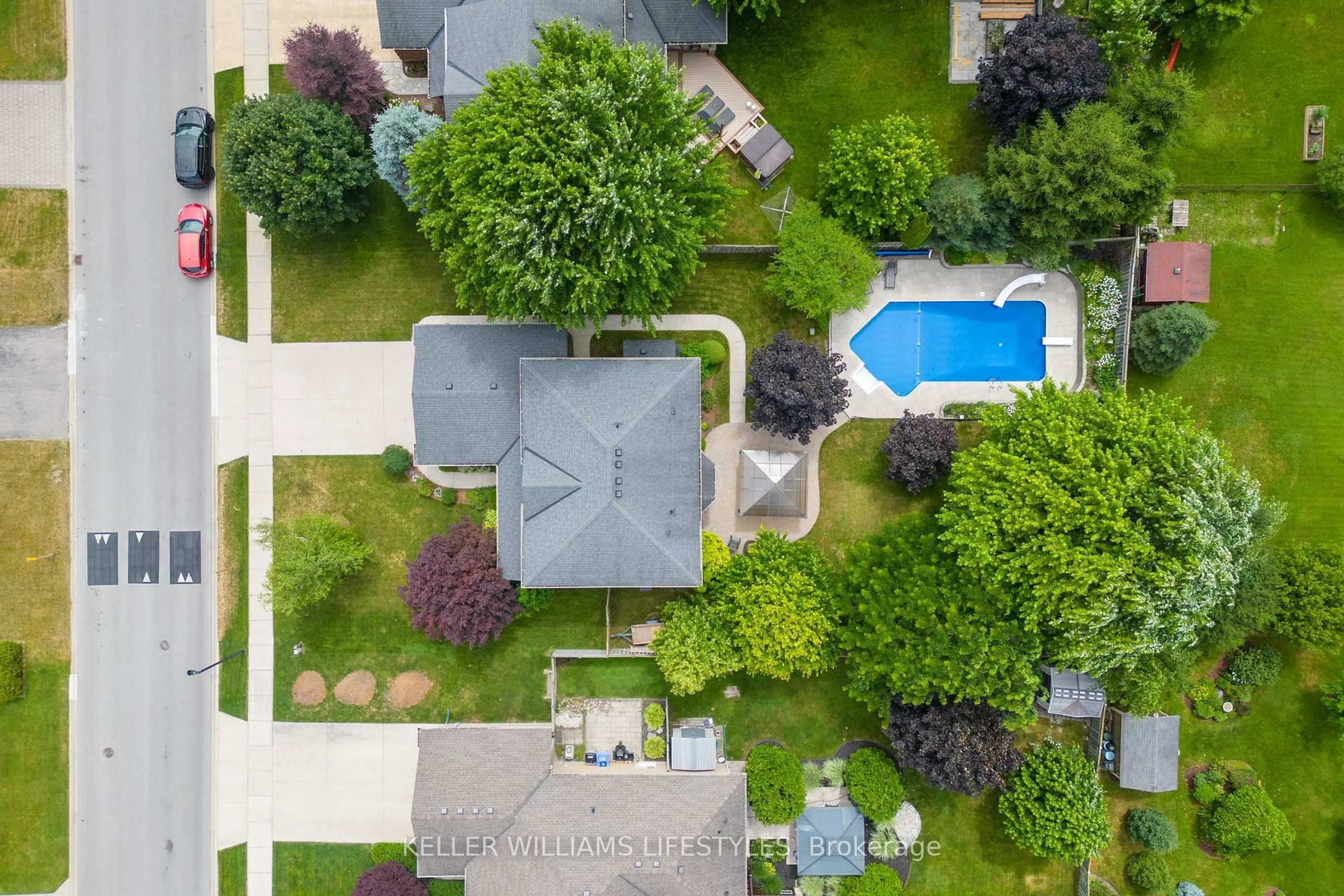 A pic from outside/outdoor area/front of a property/back of a property/a pic from drone, street for 128 Westbrook Dr, Middlesex Centre Ontario N0L 1R0
