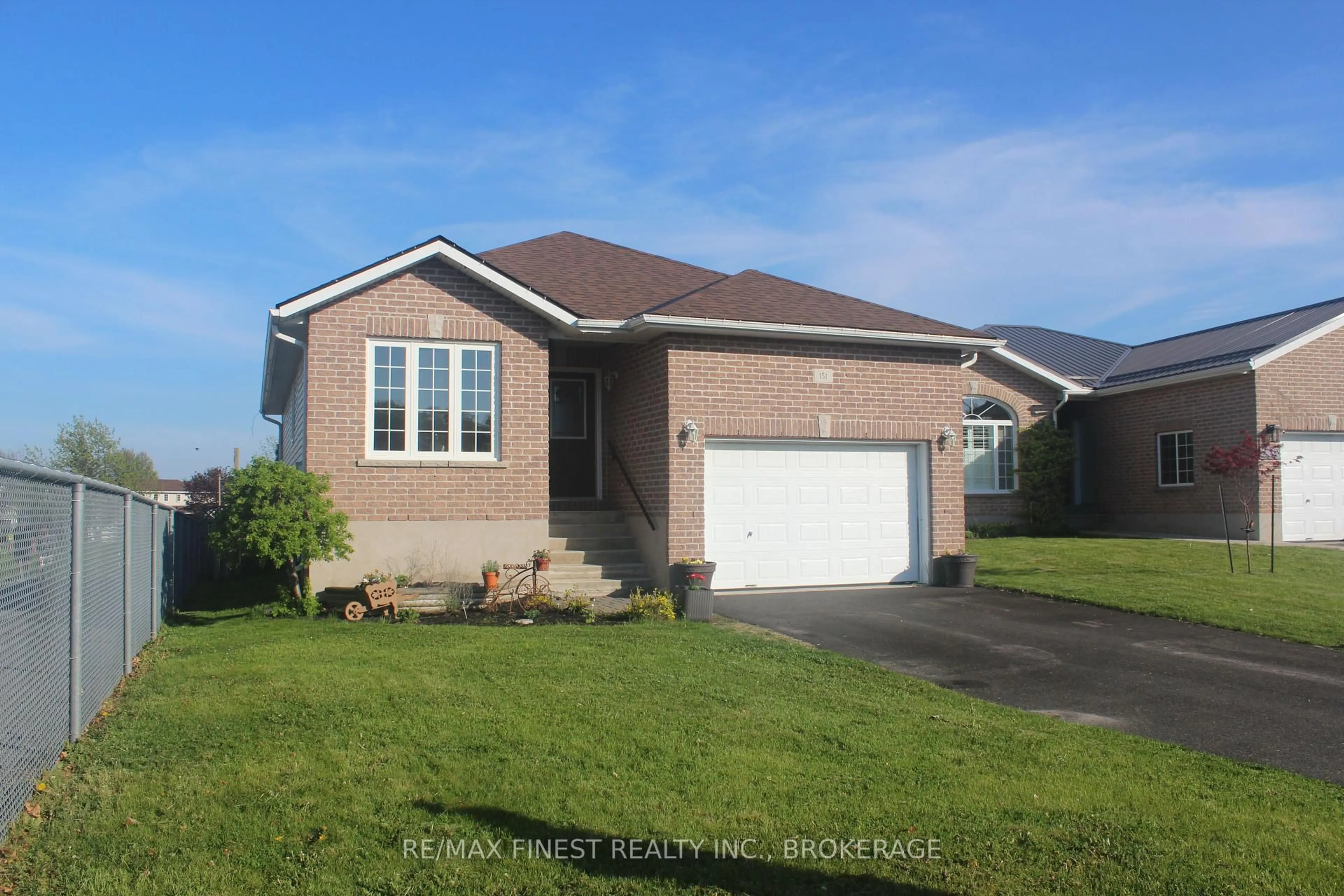 Home with vinyl exterior material, street for 151 Macdougall Dr, Loyalist Ontario K7N 0A2