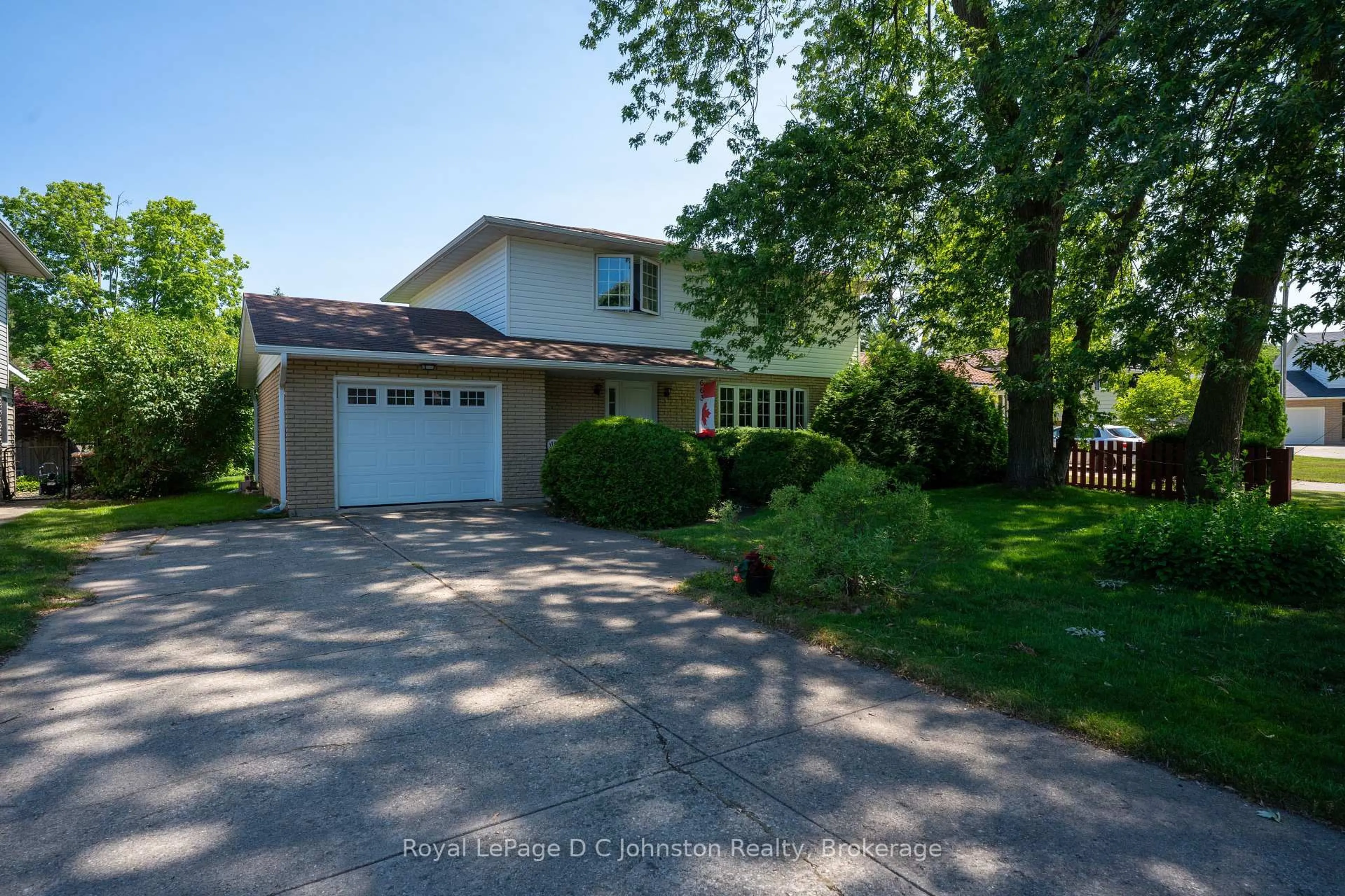 A pic from outside/outdoor area/front of a property/back of a property/a pic from drone, street for 663 Pine Grove Dr, Saugeen Shores Ontario N0H 2C3
